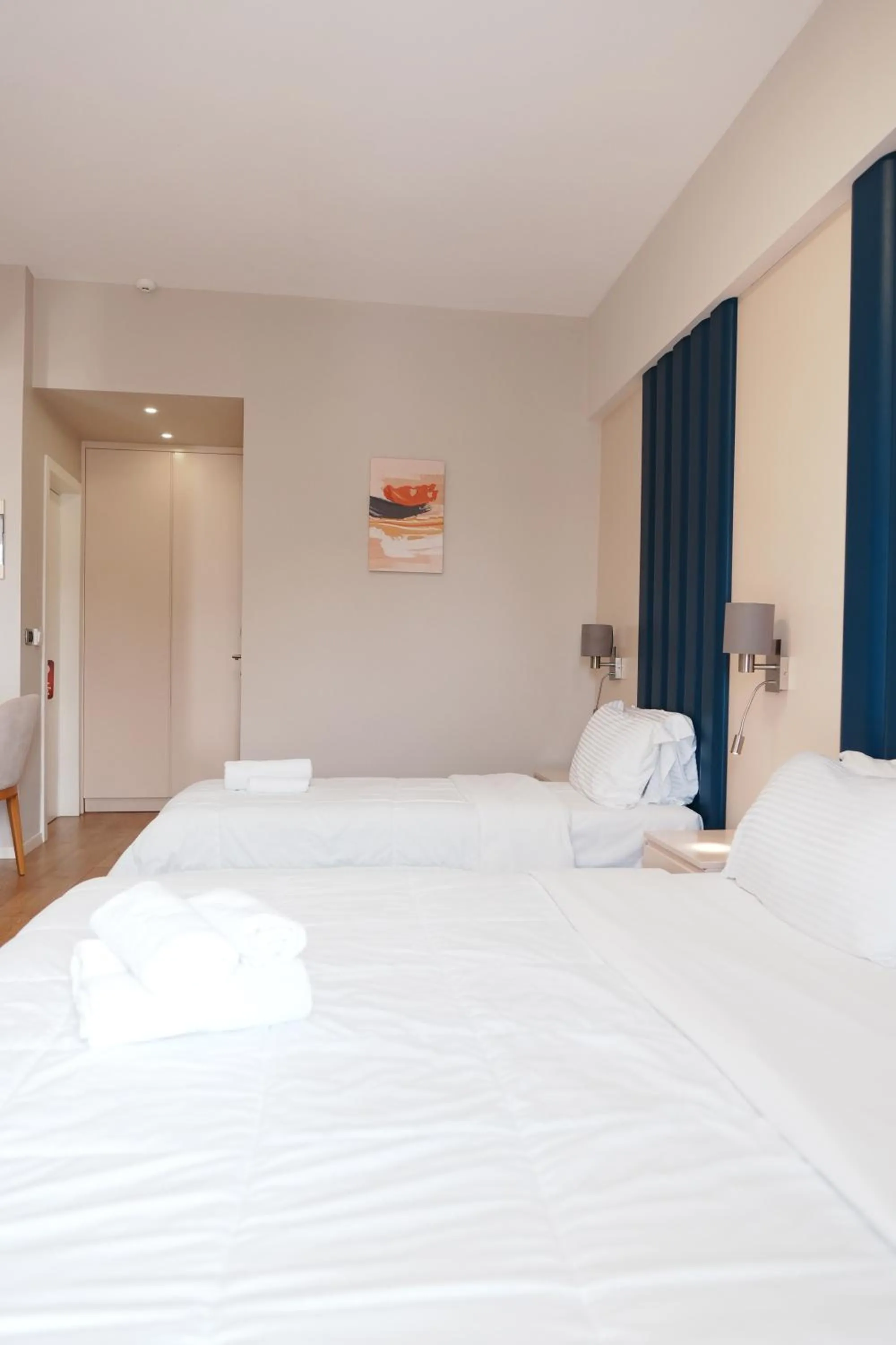 Bed in Hotel Blue Sky