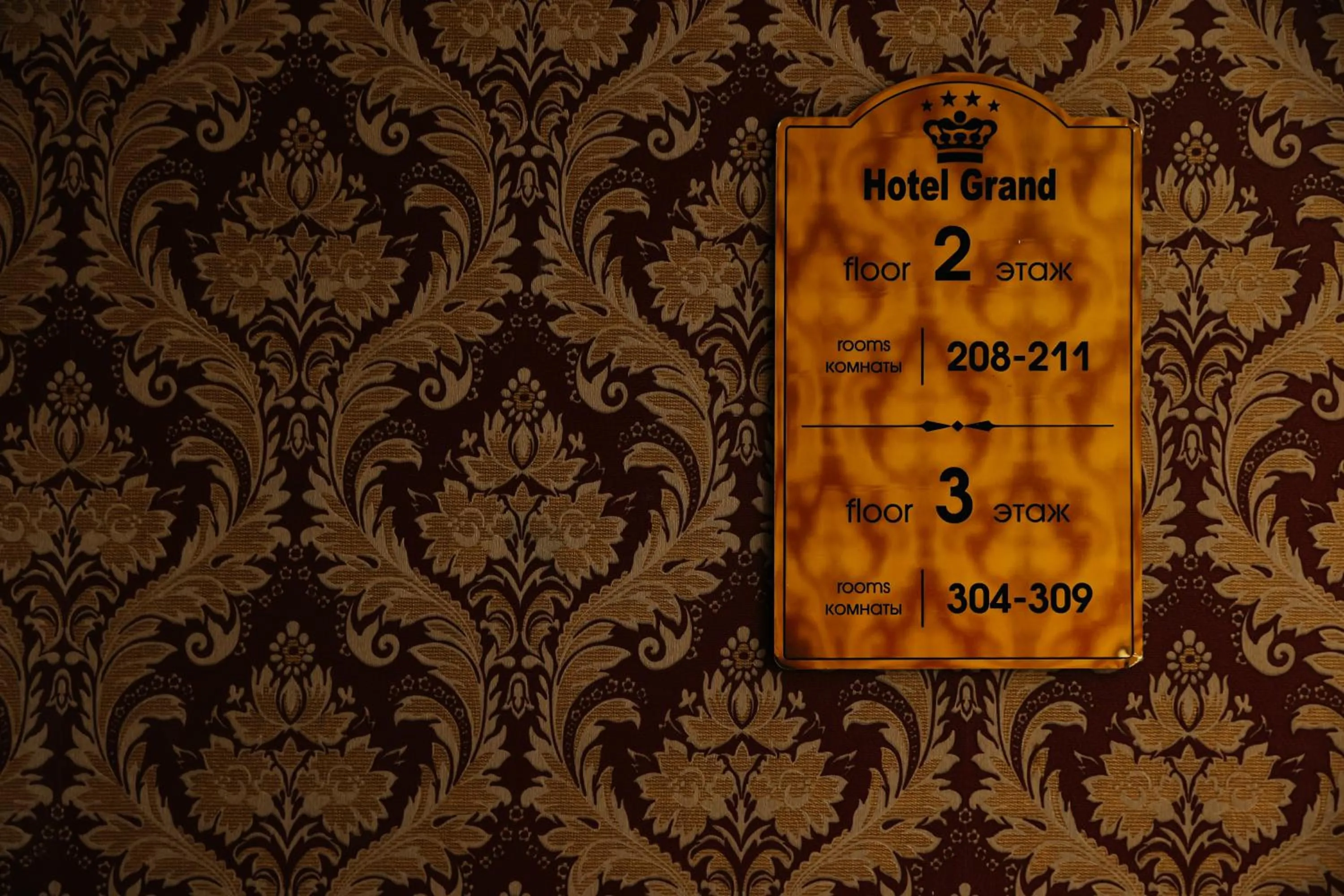 Property logo or sign in Grand Hotel