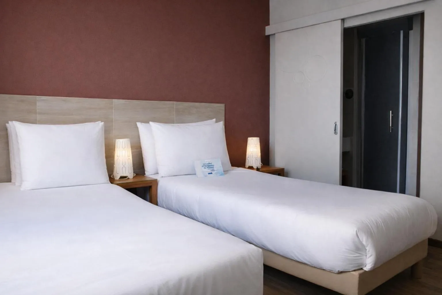 Bed in Kyriad Perpignan Sud