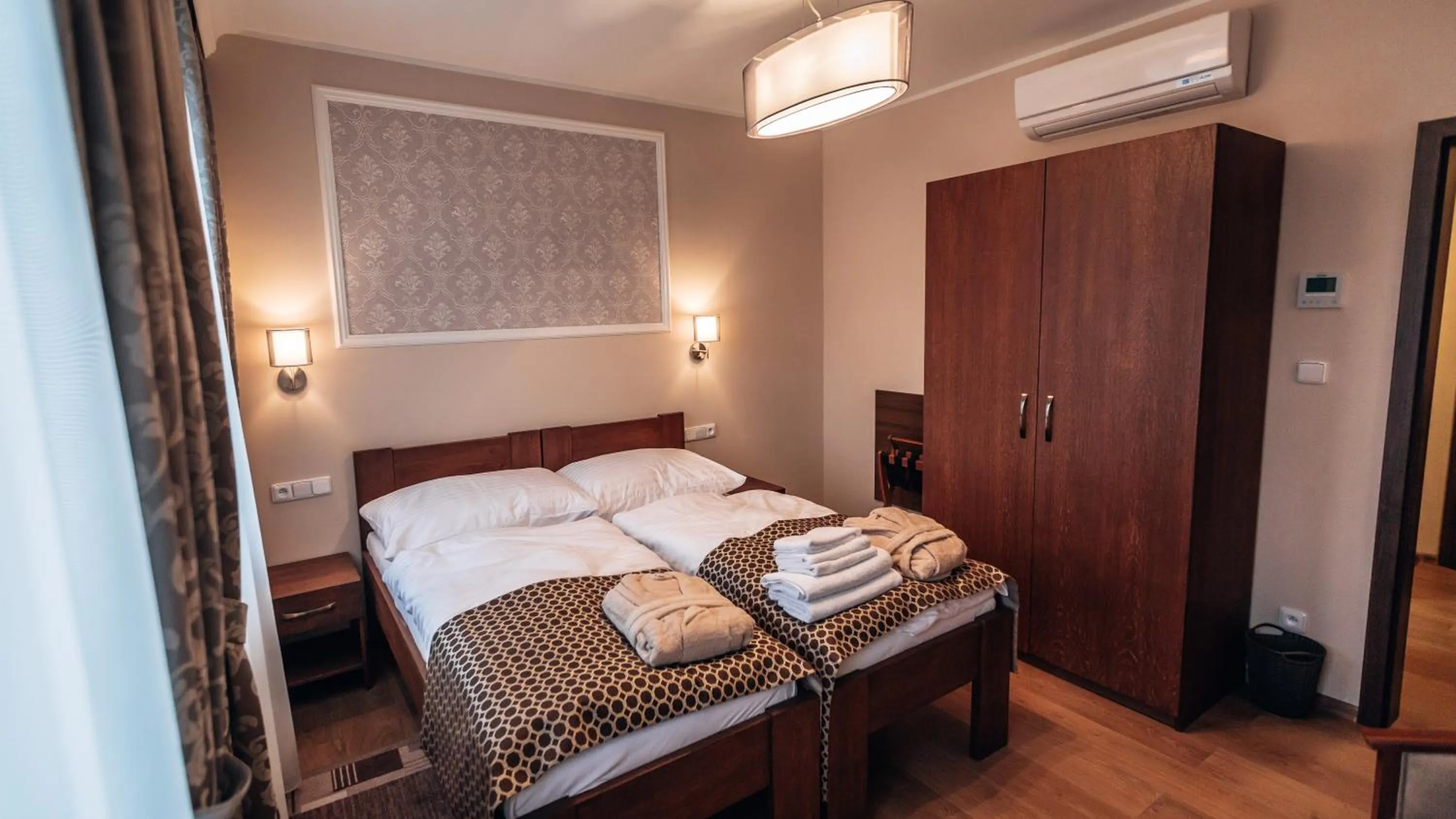 Photo of the whole room, Bed in Star Hotel