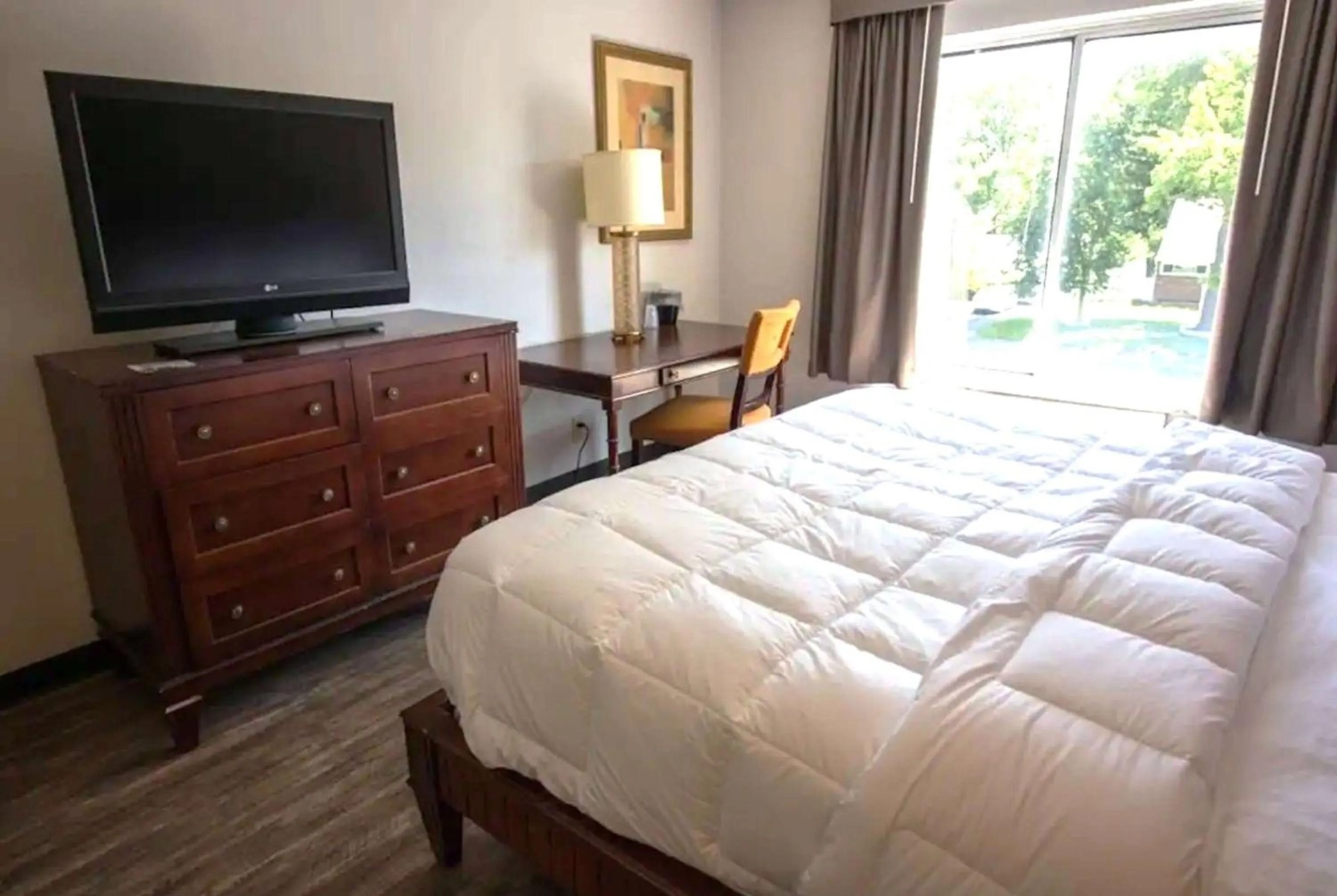 Photo of the whole room, Bed in Baymont Inn and Suites by Wyndham Columbus / Near OSU