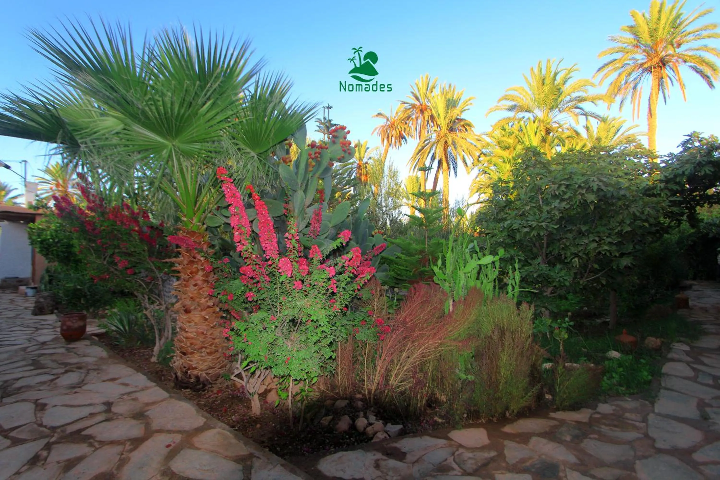 Property logo or sign in Maison Nomades