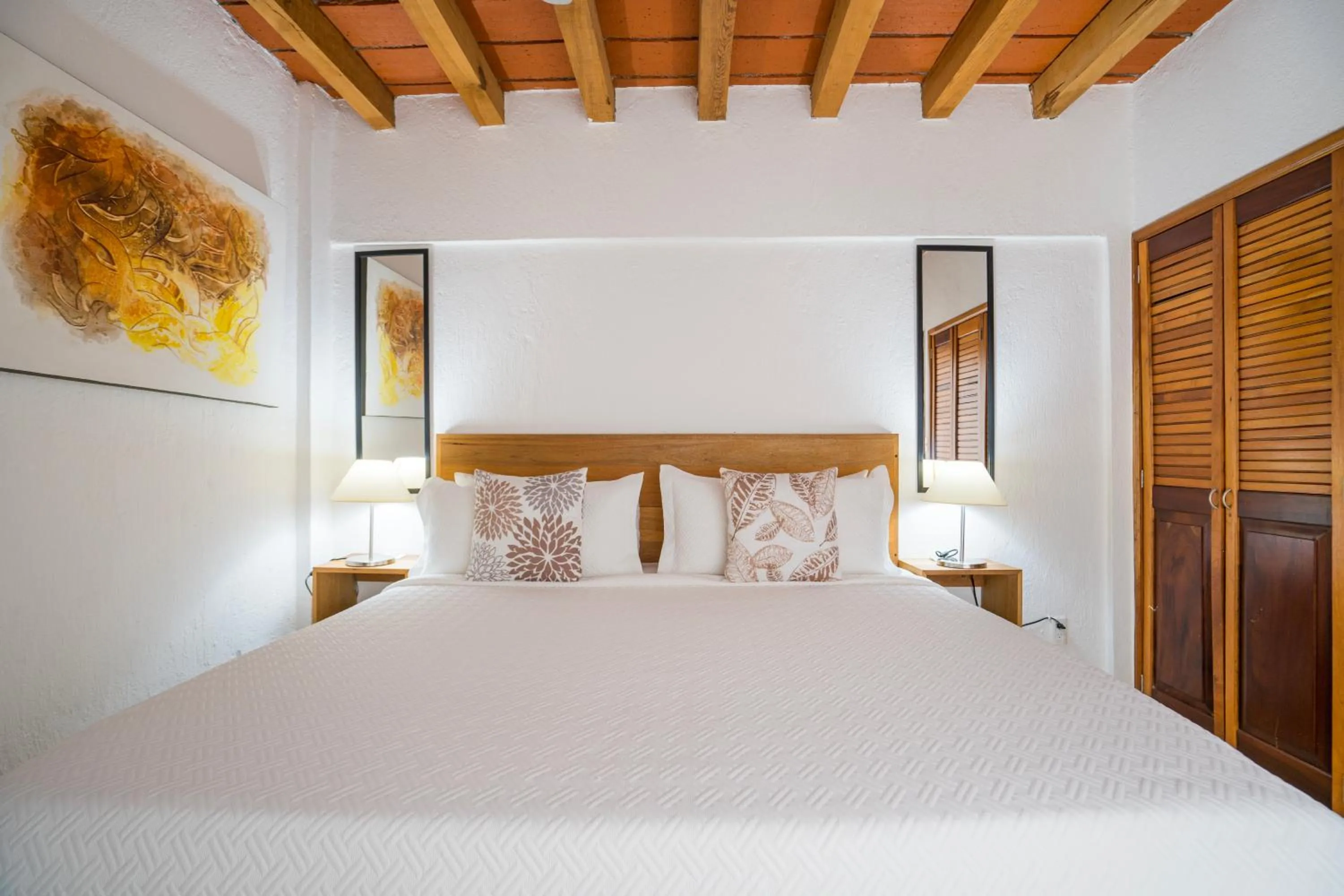 Bed in Olas Altas Suites Departamentos