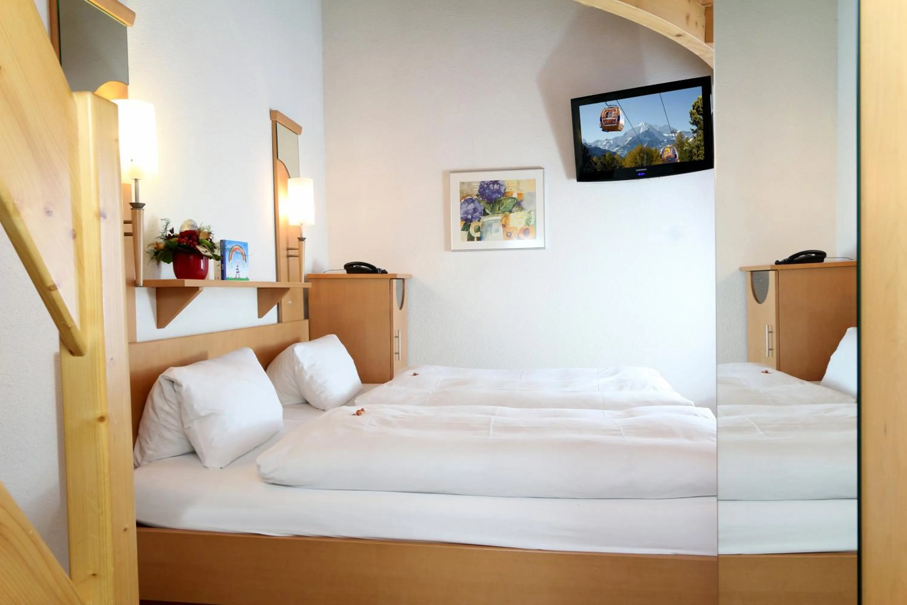 Bed in Lifestyle & Spa Hotel Grächerhof