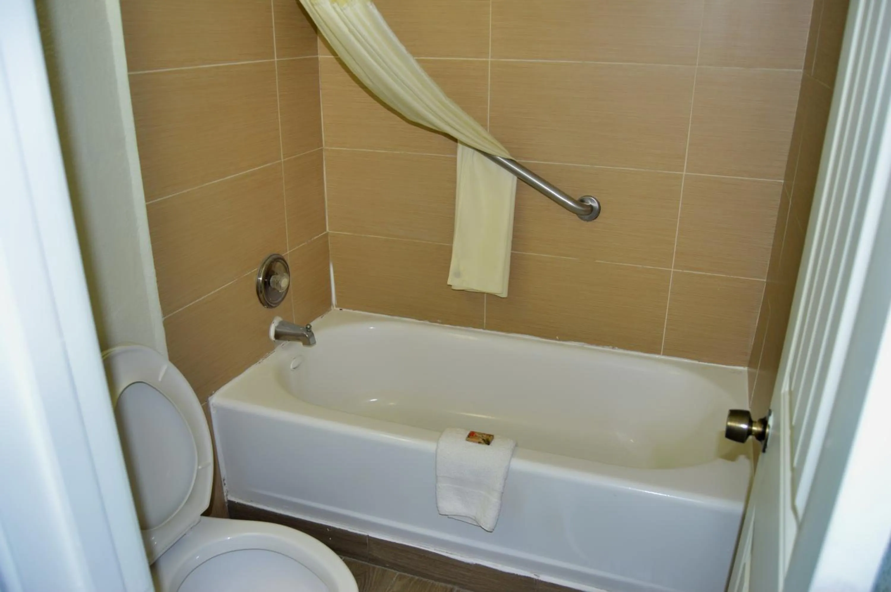 Bathroom in Days Inn by Wyndham Hardeeville Near Hilton Head