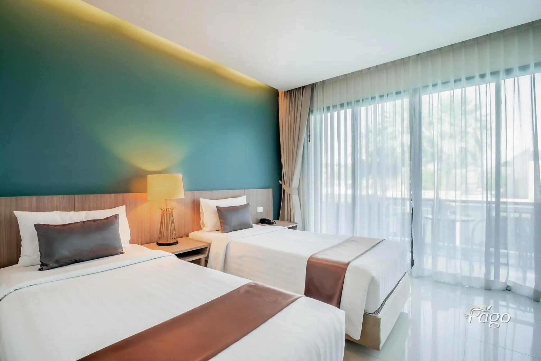 Bed in The Pago Design Hotel Phuket-SHA Plus