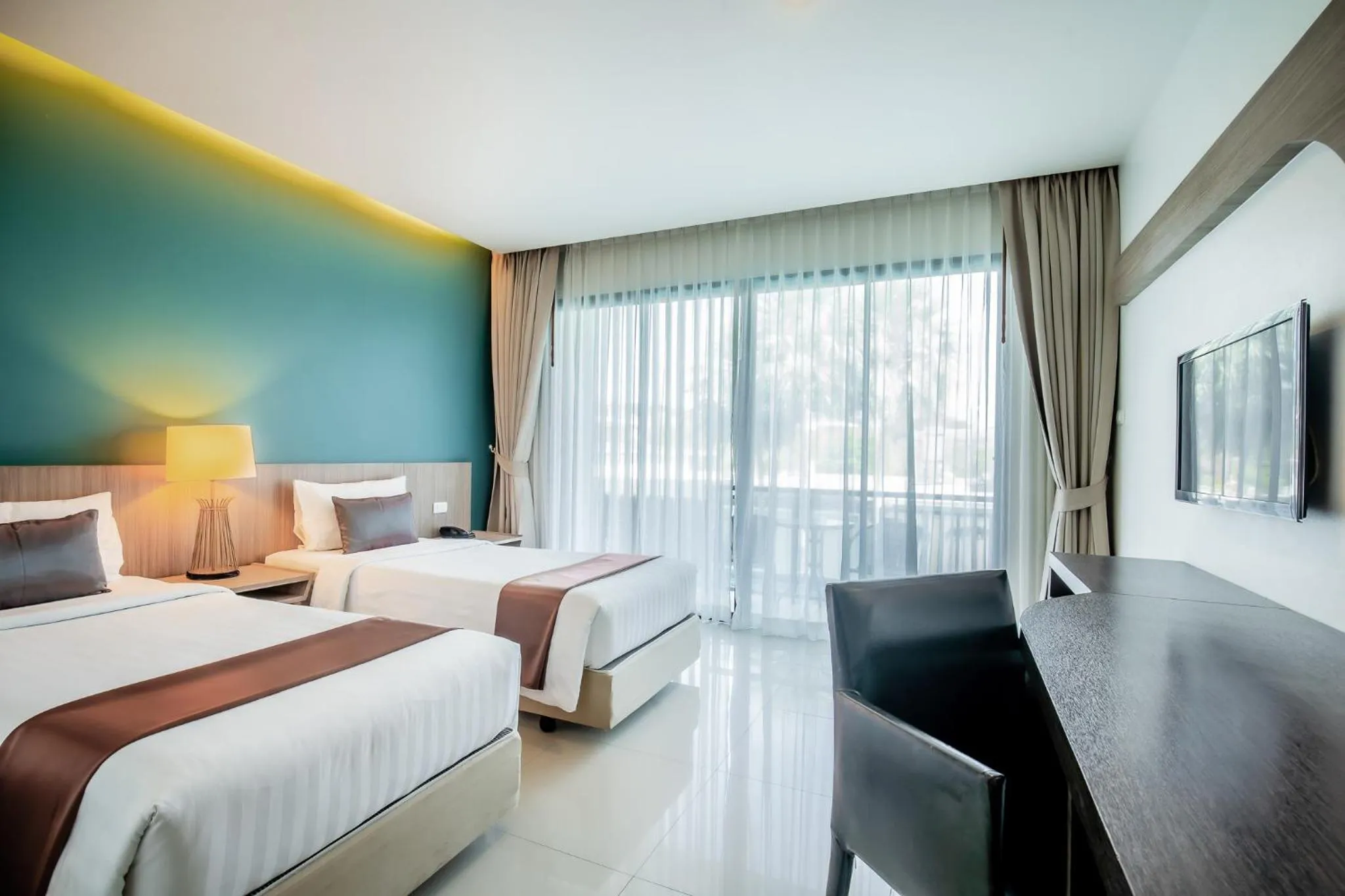 Photo of the whole room, Bed in The Pago Design Hotel Phuket-SHA Plus