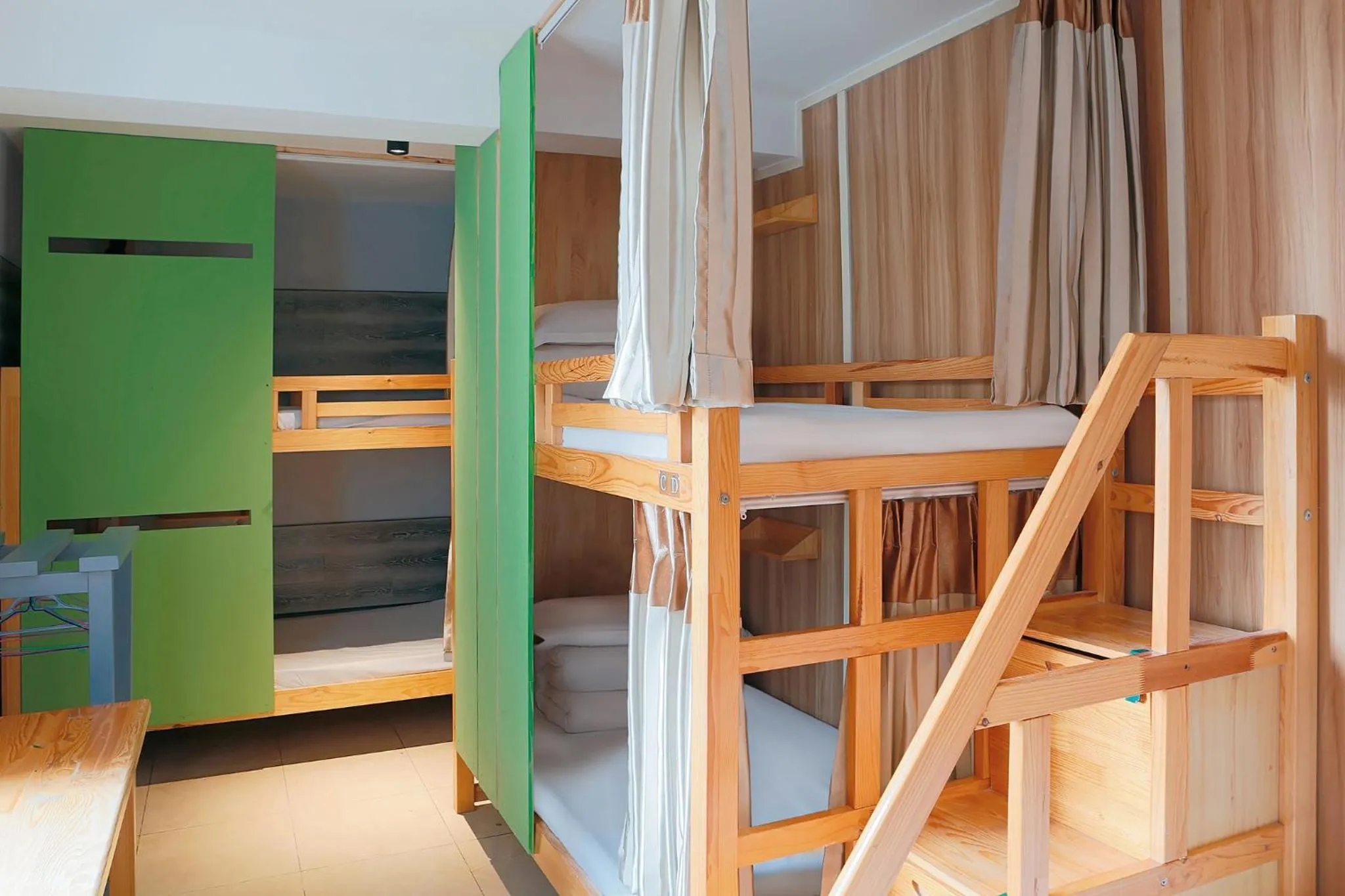 bunk bed, Bed in Kunming Upland International Youth Hostel near the city center ,2 mins walk to the subway, 2 mins walk to the Green Lake, Close to Yuan tong Temple, Old street, Yunnan University, English-speaking service convenient payment and visa cards are accepted