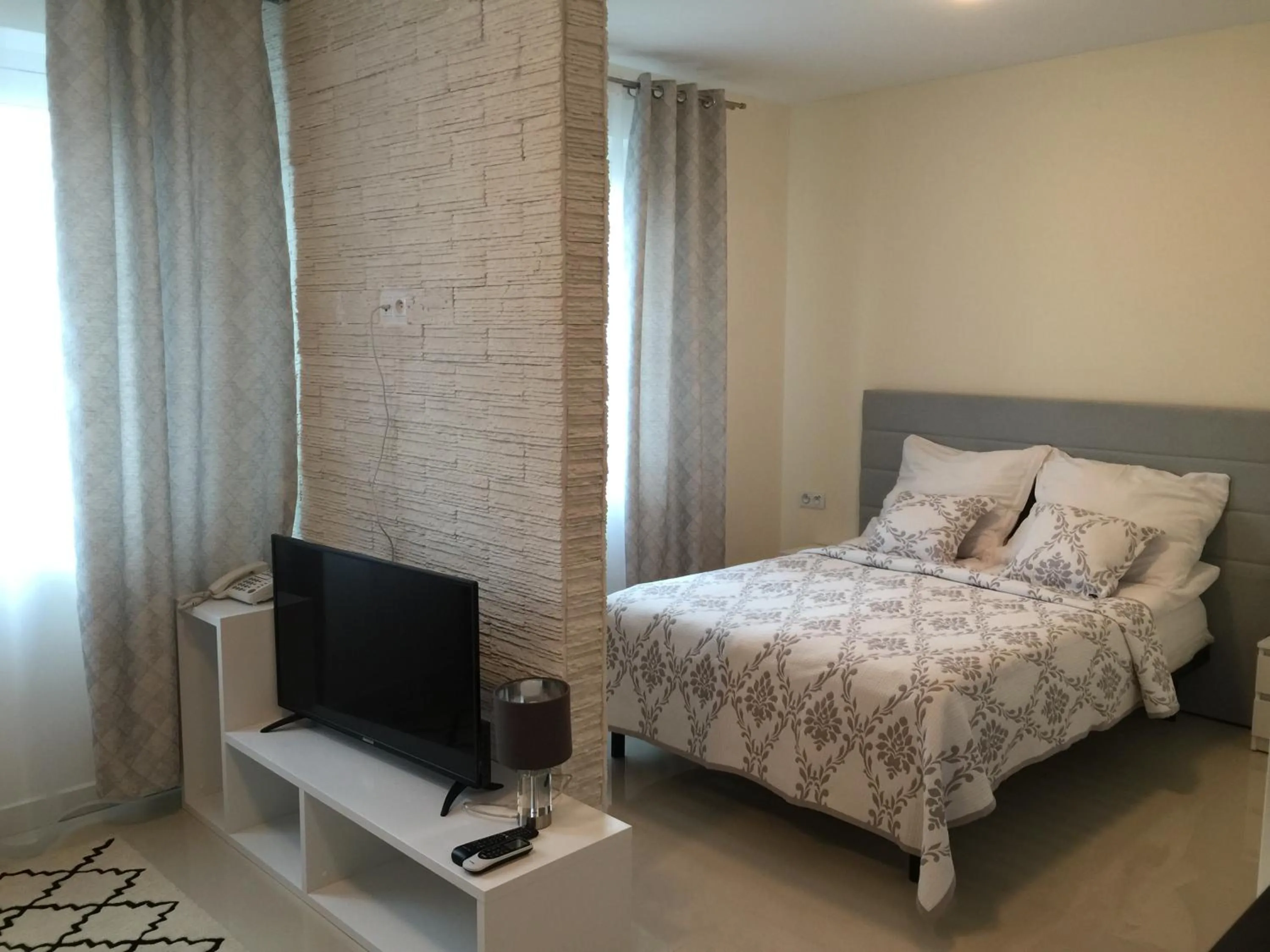 Bed in Aparthotel Koroni Home