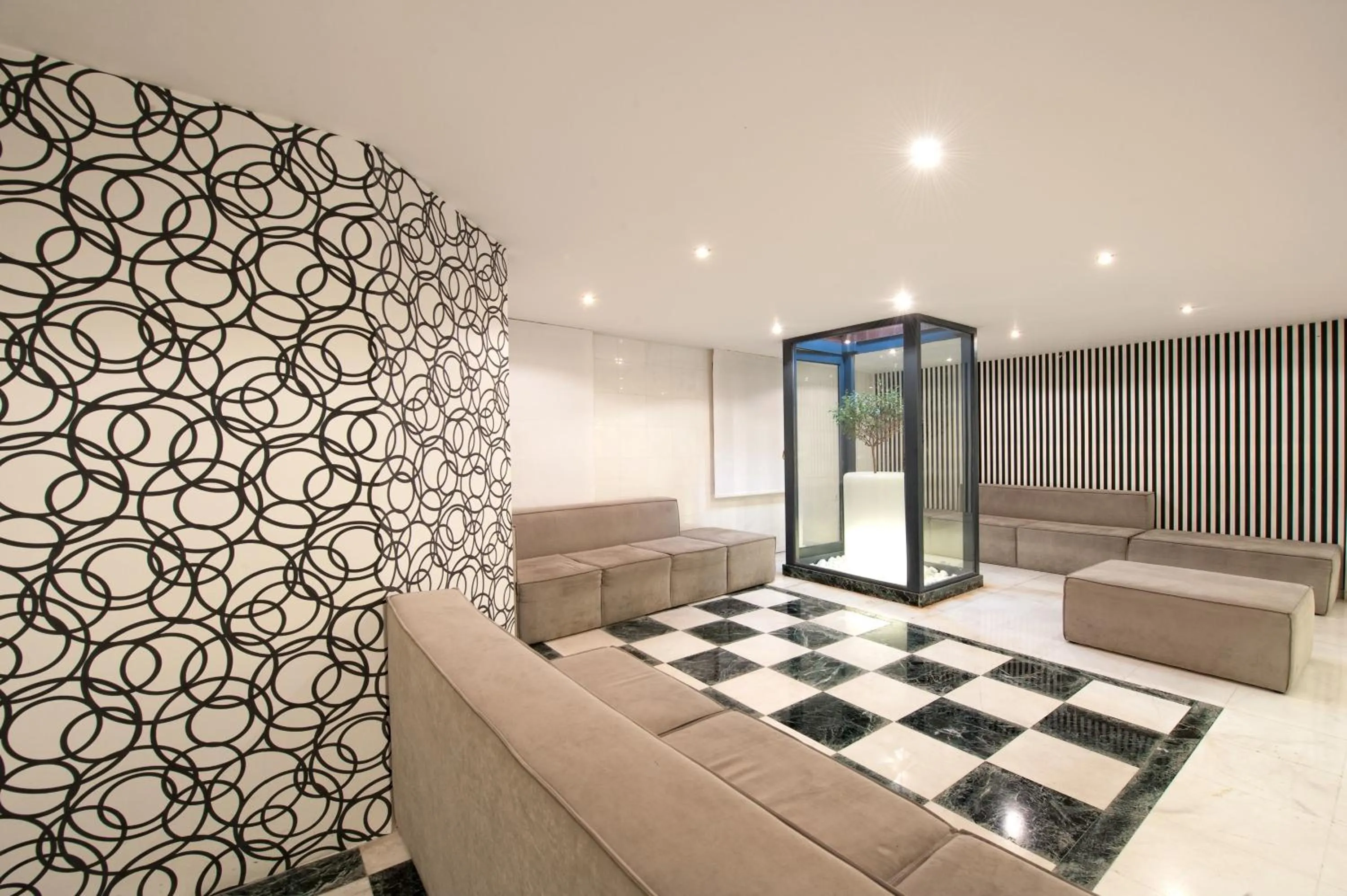 Lobby or reception in Heronissos Hotel