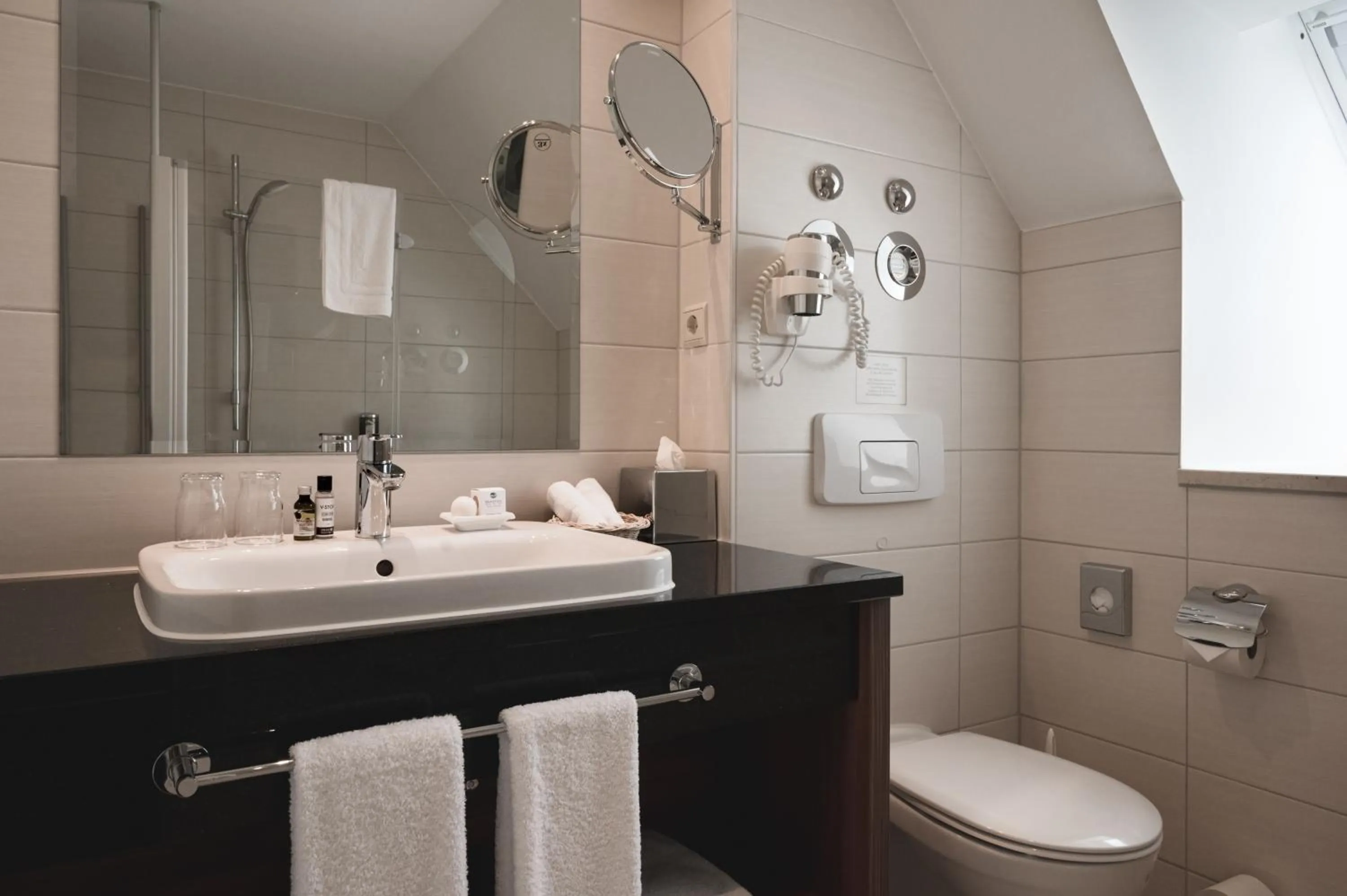 Bathroom in Balmer See – Hotel•Golf•Spa