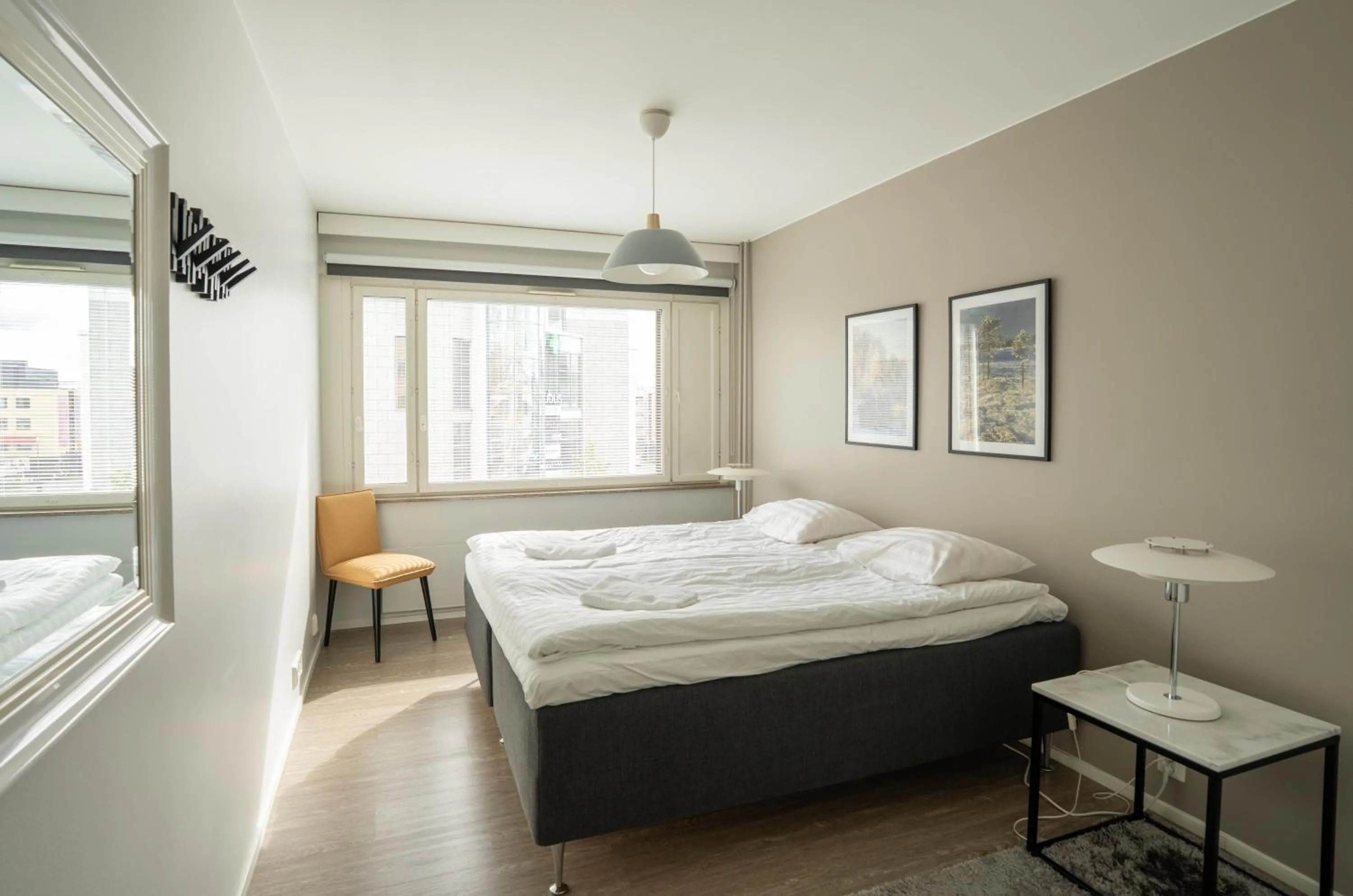 Bed in The Luxury Downtown Rovaniemi with sauna