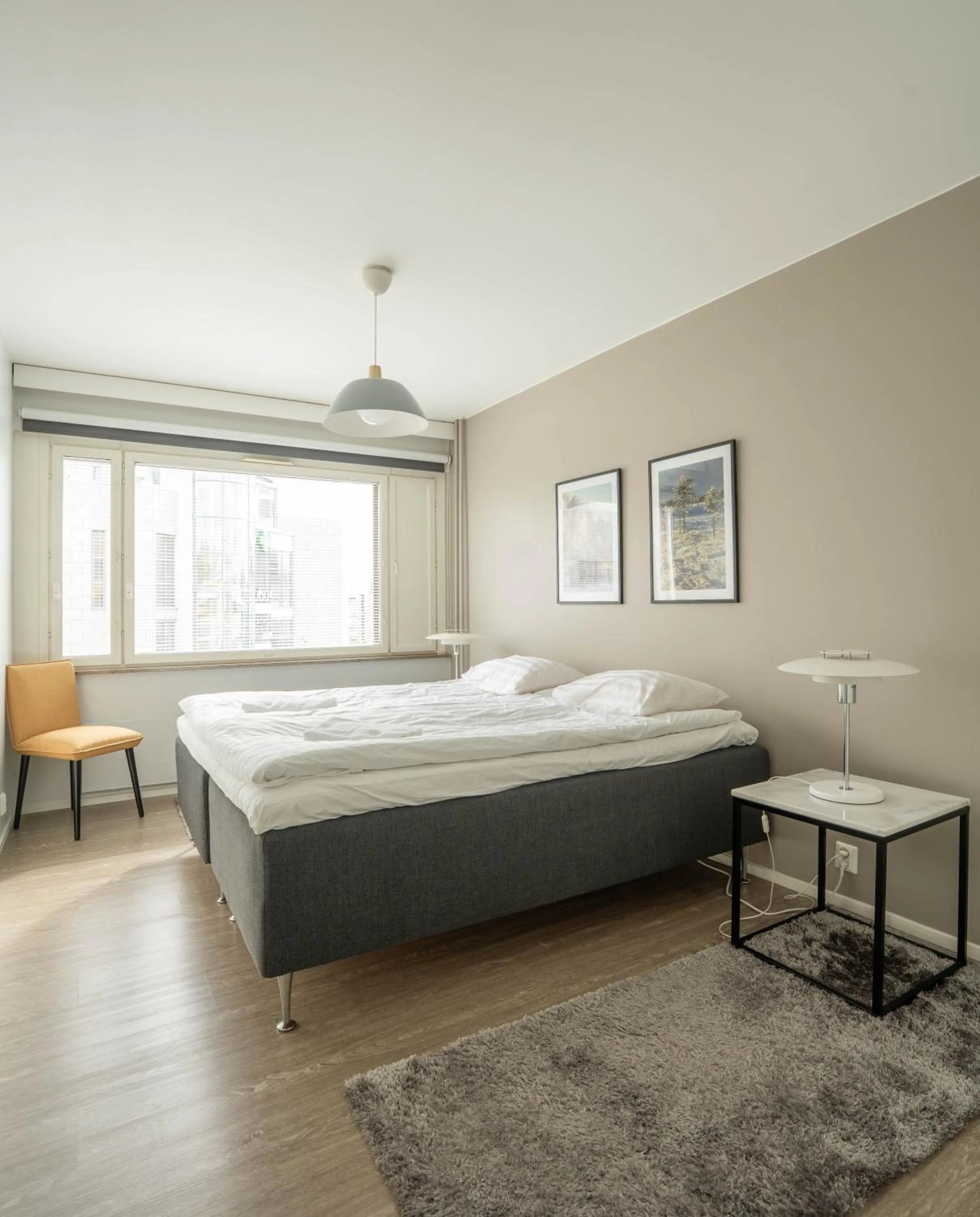 Bed in The Luxury Downtown Rovaniemi with sauna