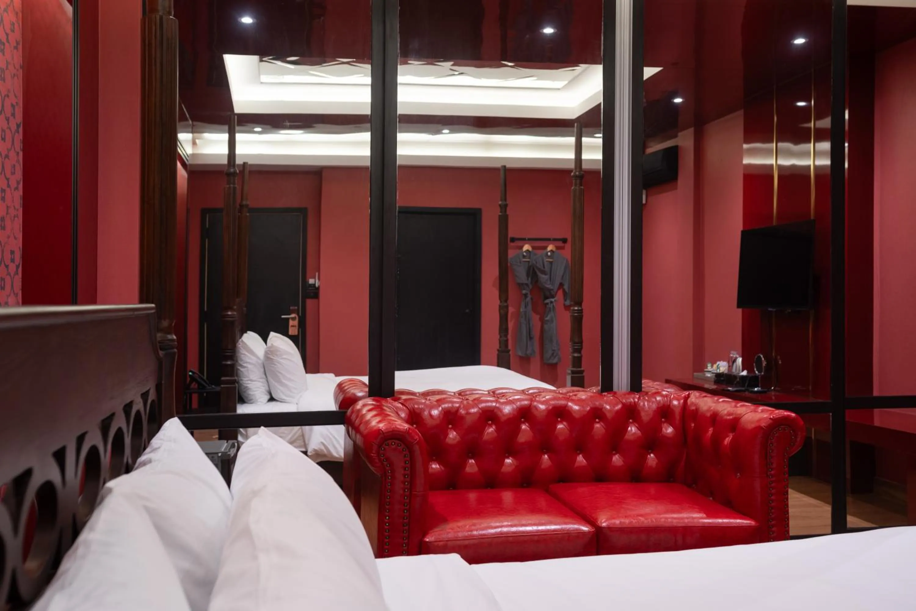 Seating area, Bed in G Boutique Silom Hotel