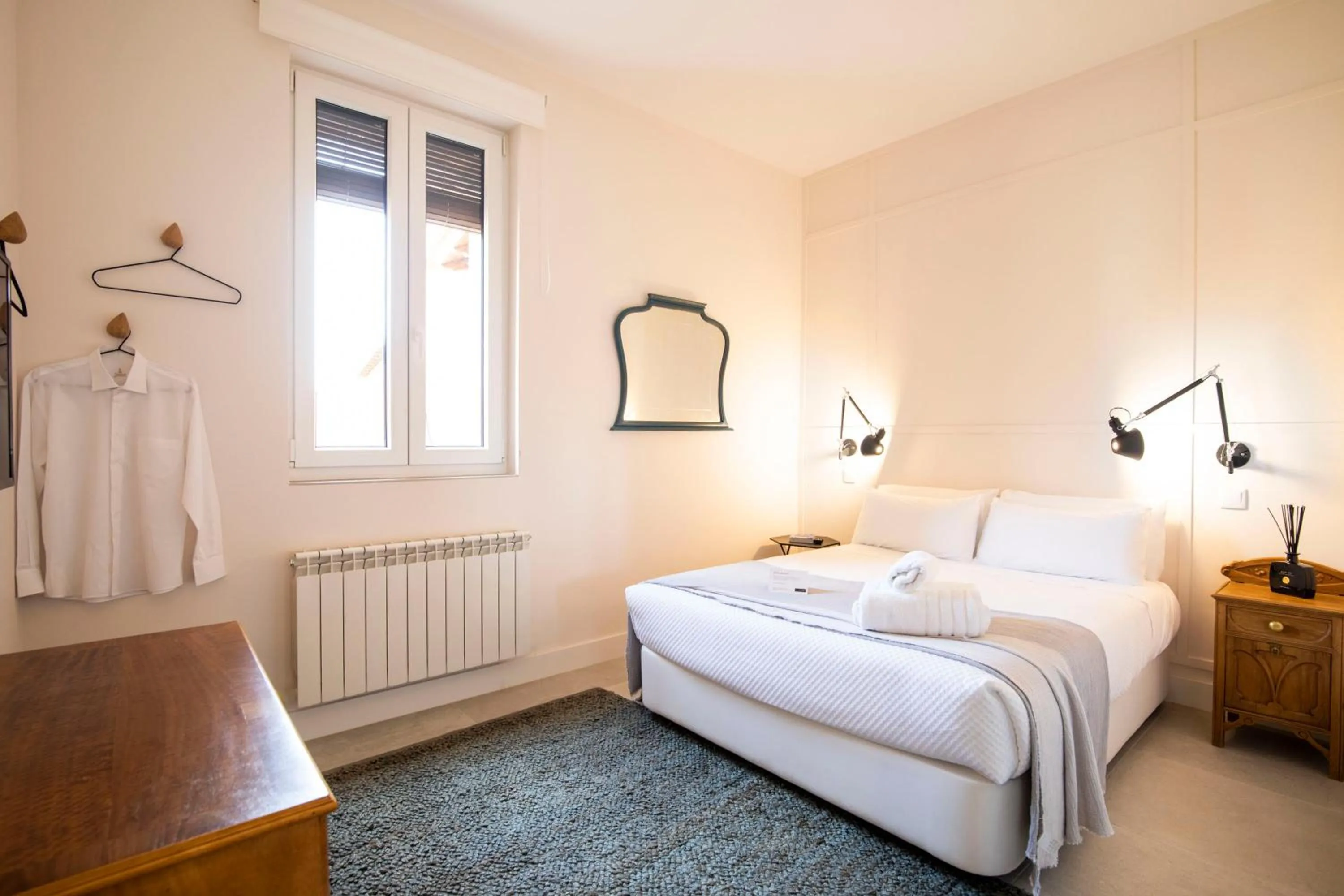 Bed in SANMARTINA HOTEL