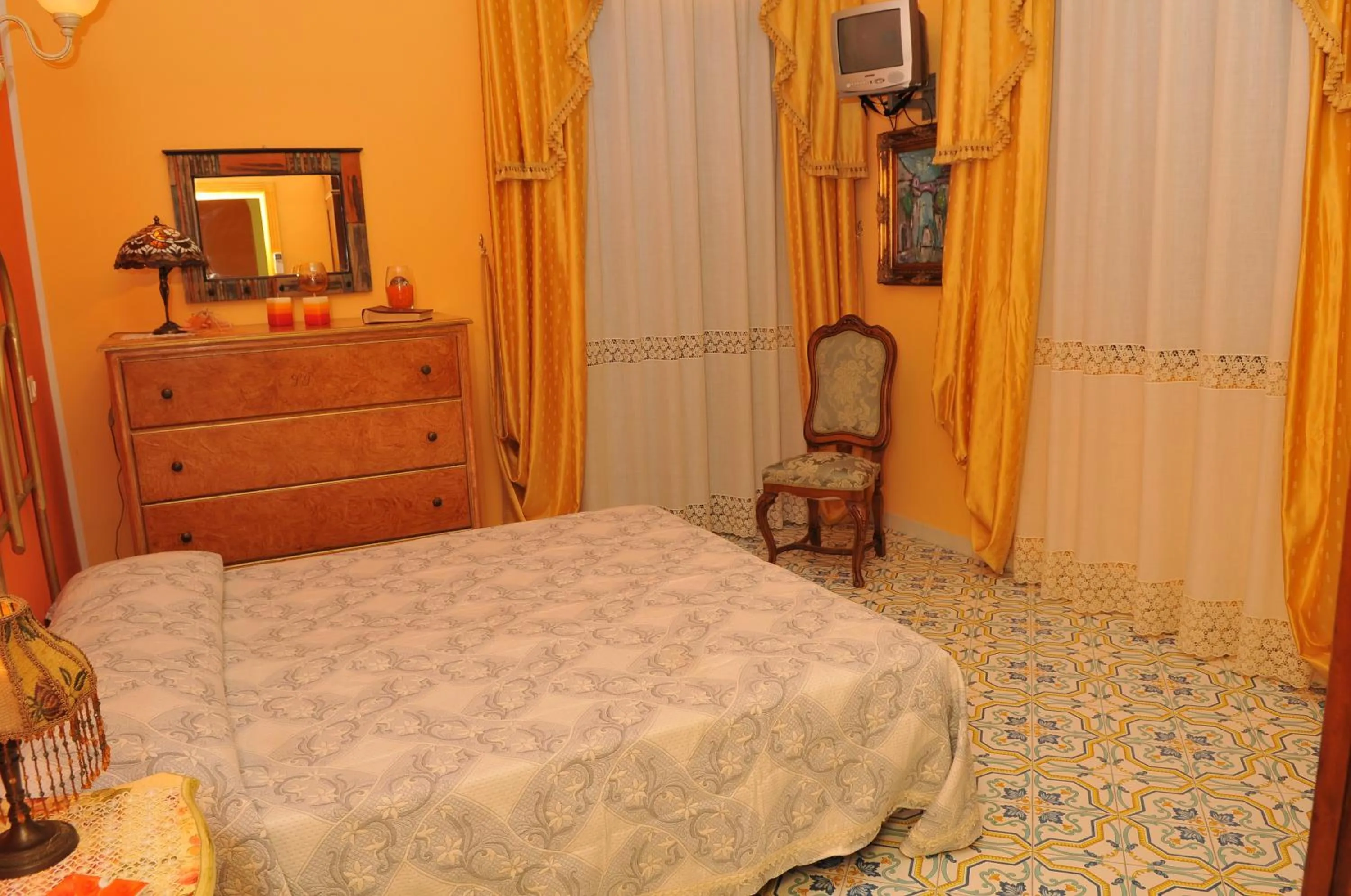 Bed in Albergo Roses