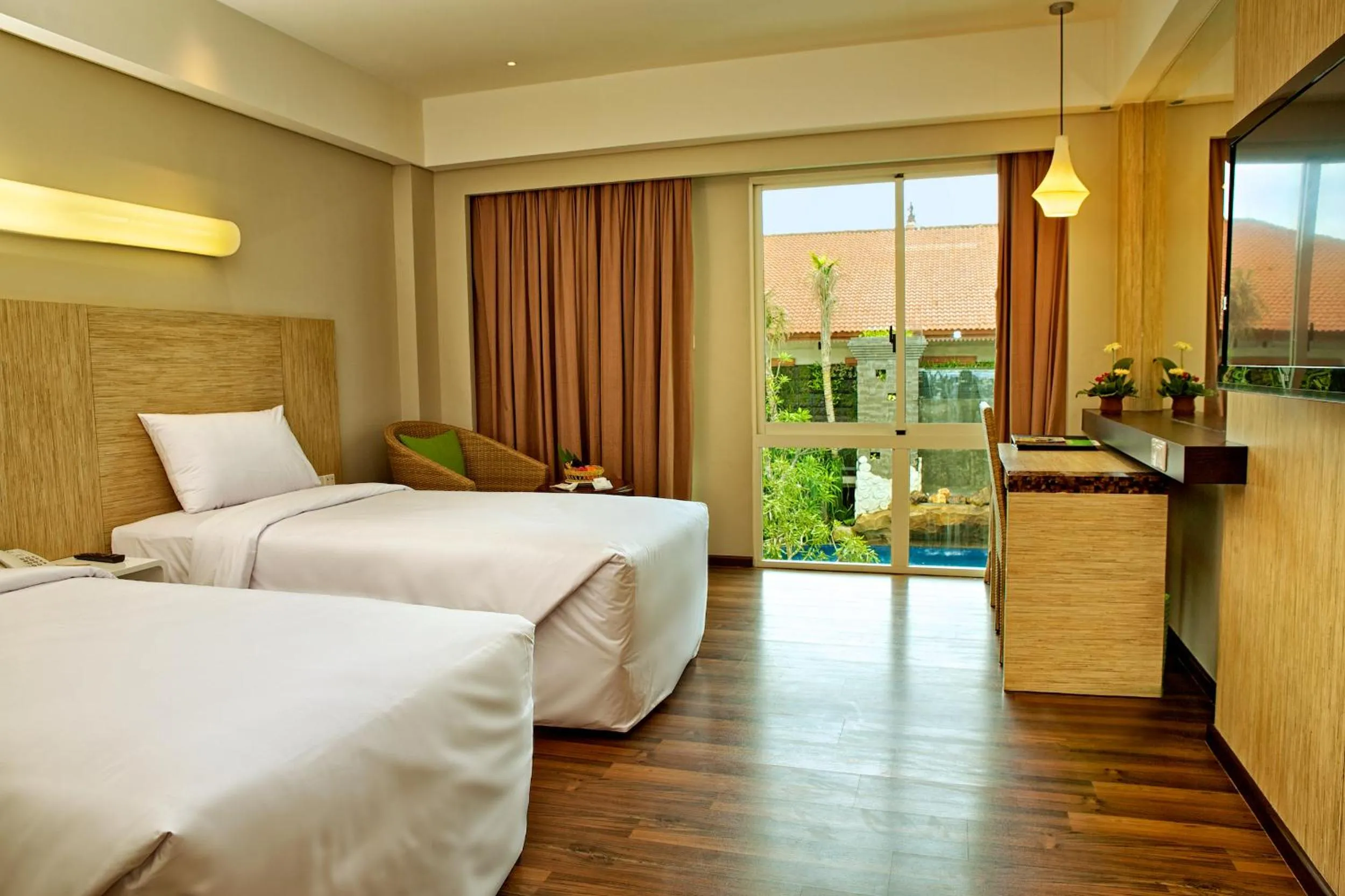 Photo of the whole room, Bed in Bintang Kuta Hotel