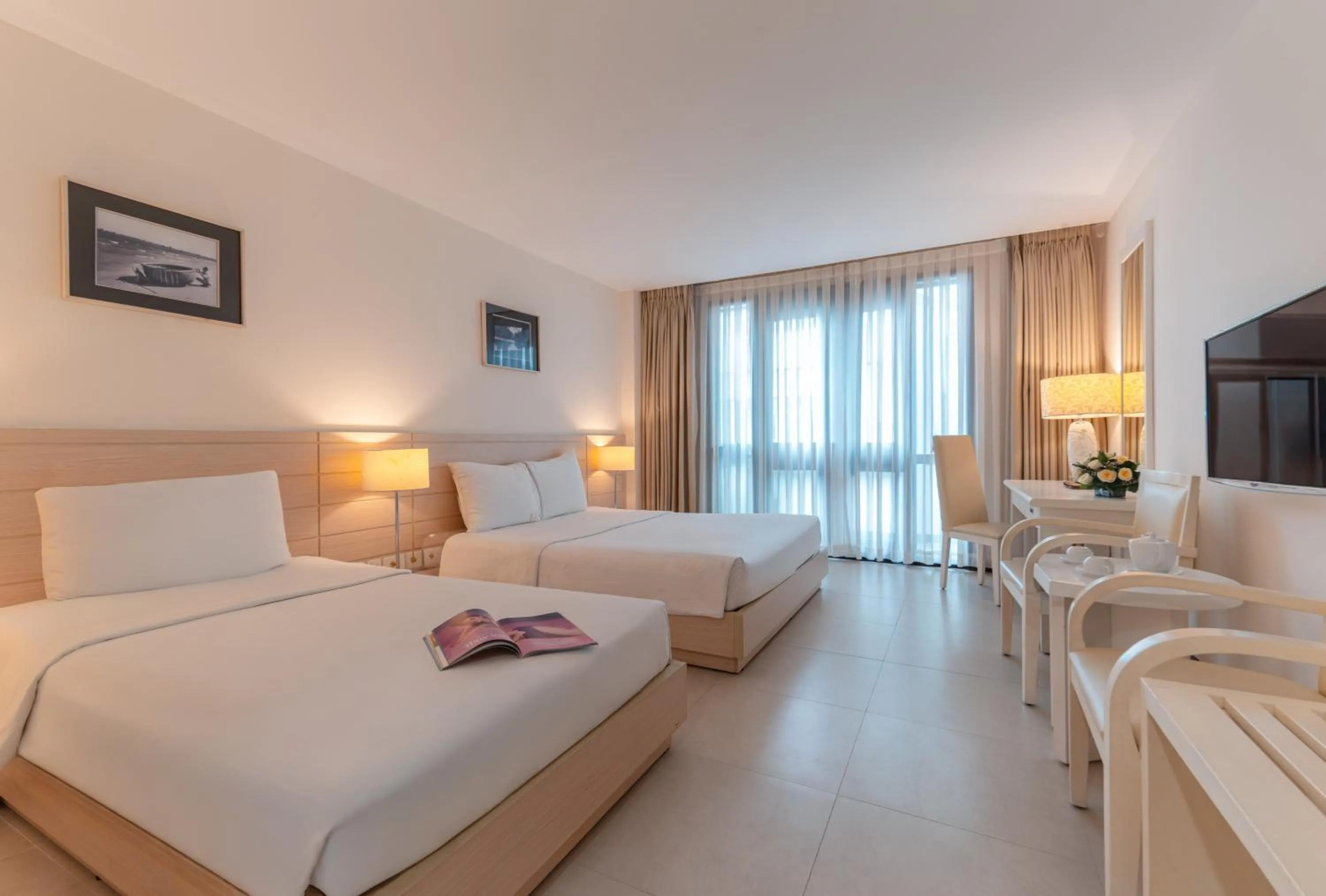 Photo of the whole room, Bed in Nhi Phi Hotel