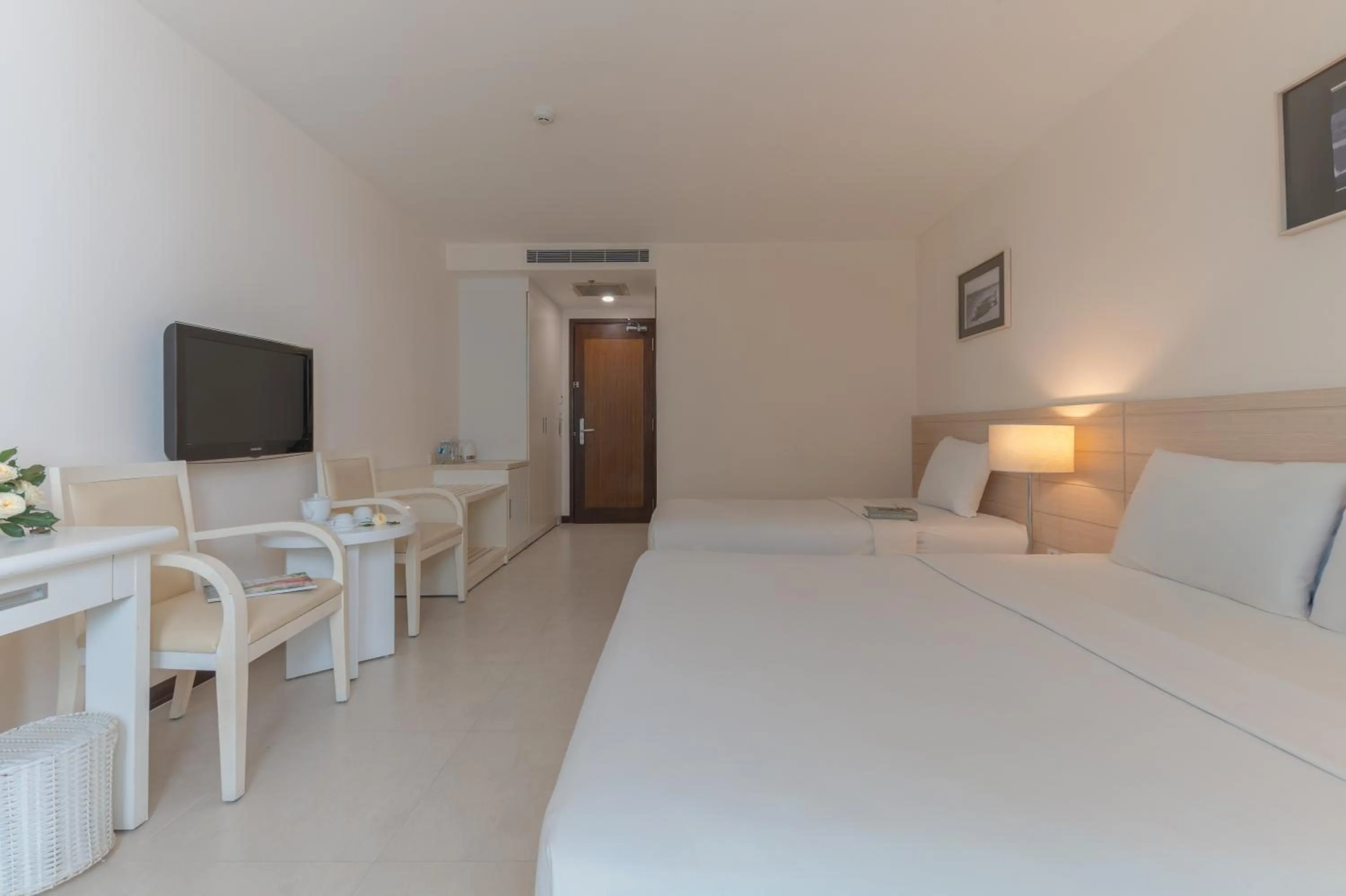 Photo of the whole room, Bed in Nhi Phi Hotel