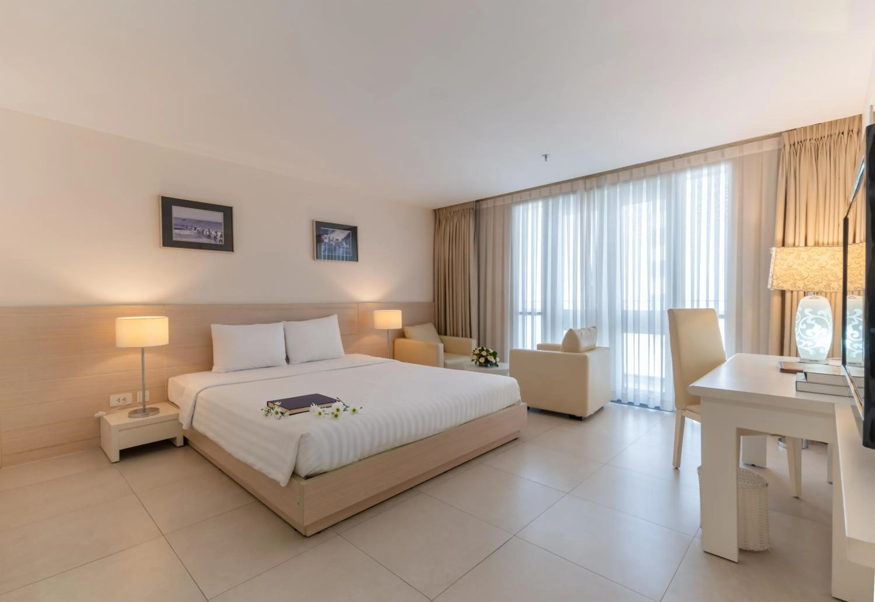 Photo of the whole room, Bed in Nhi Phi Hotel