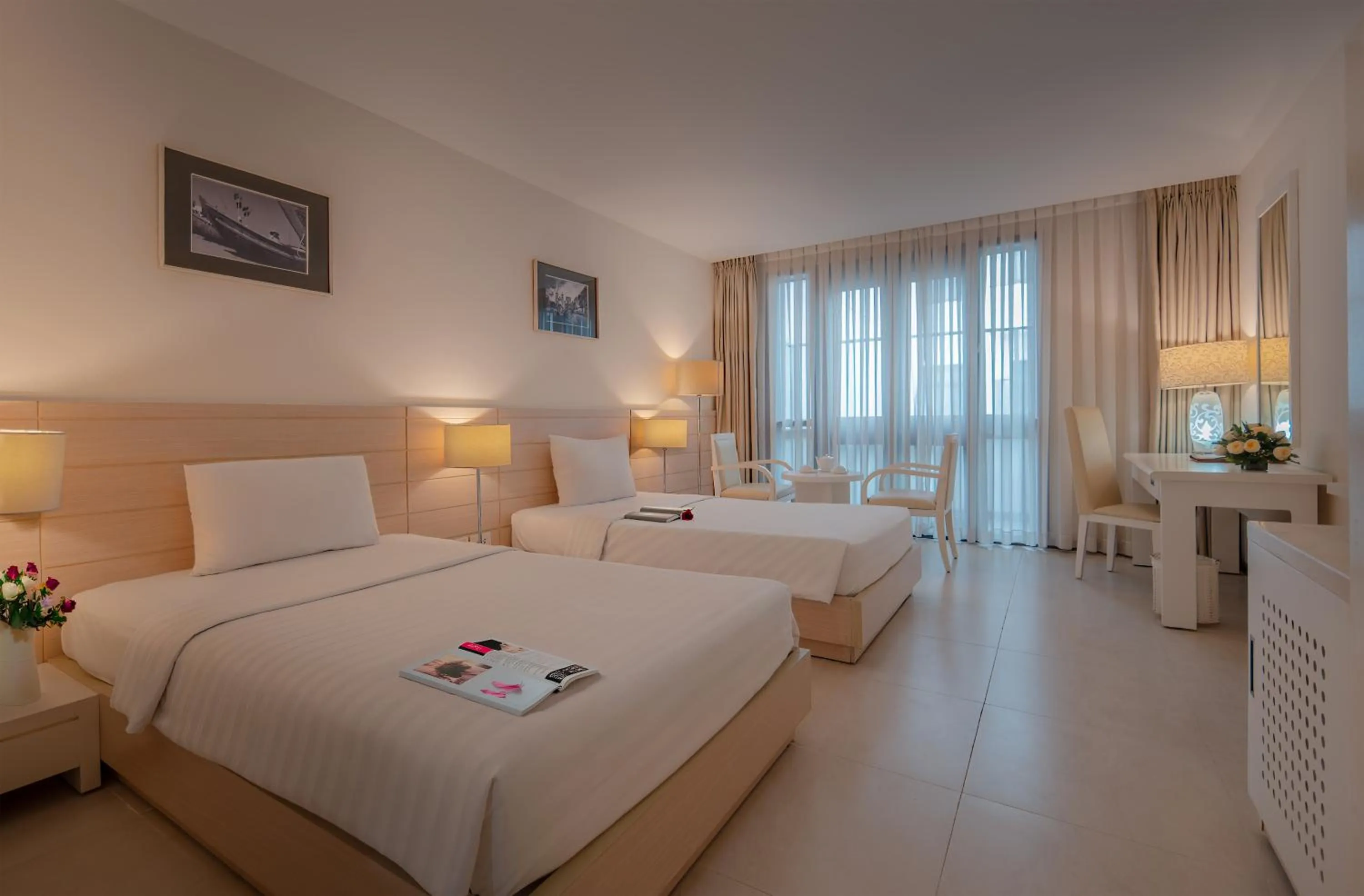 Photo of the whole room, Bed in Nhi Phi Hotel