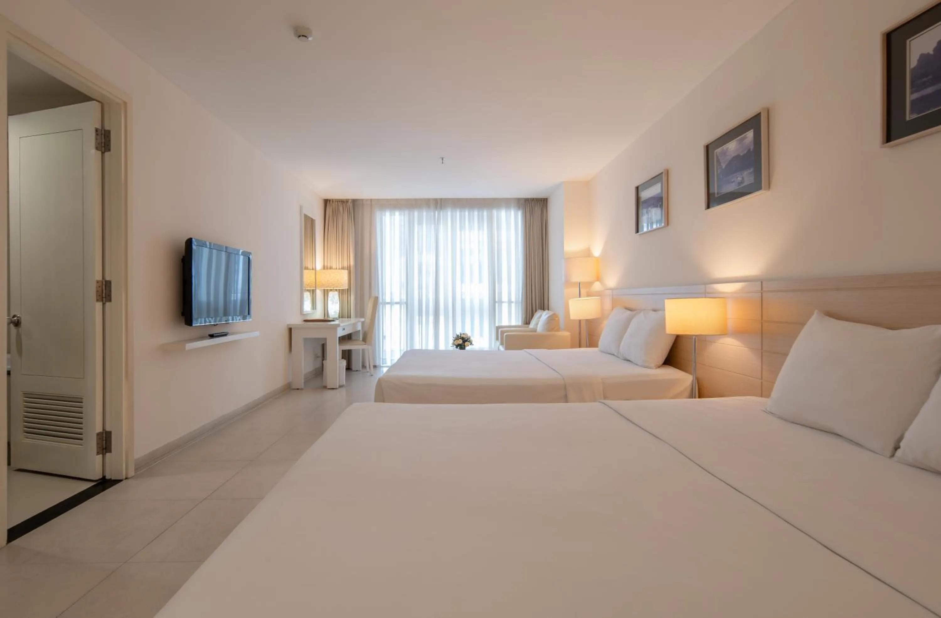 Photo of the whole room, Bed in Nhi Phi Hotel