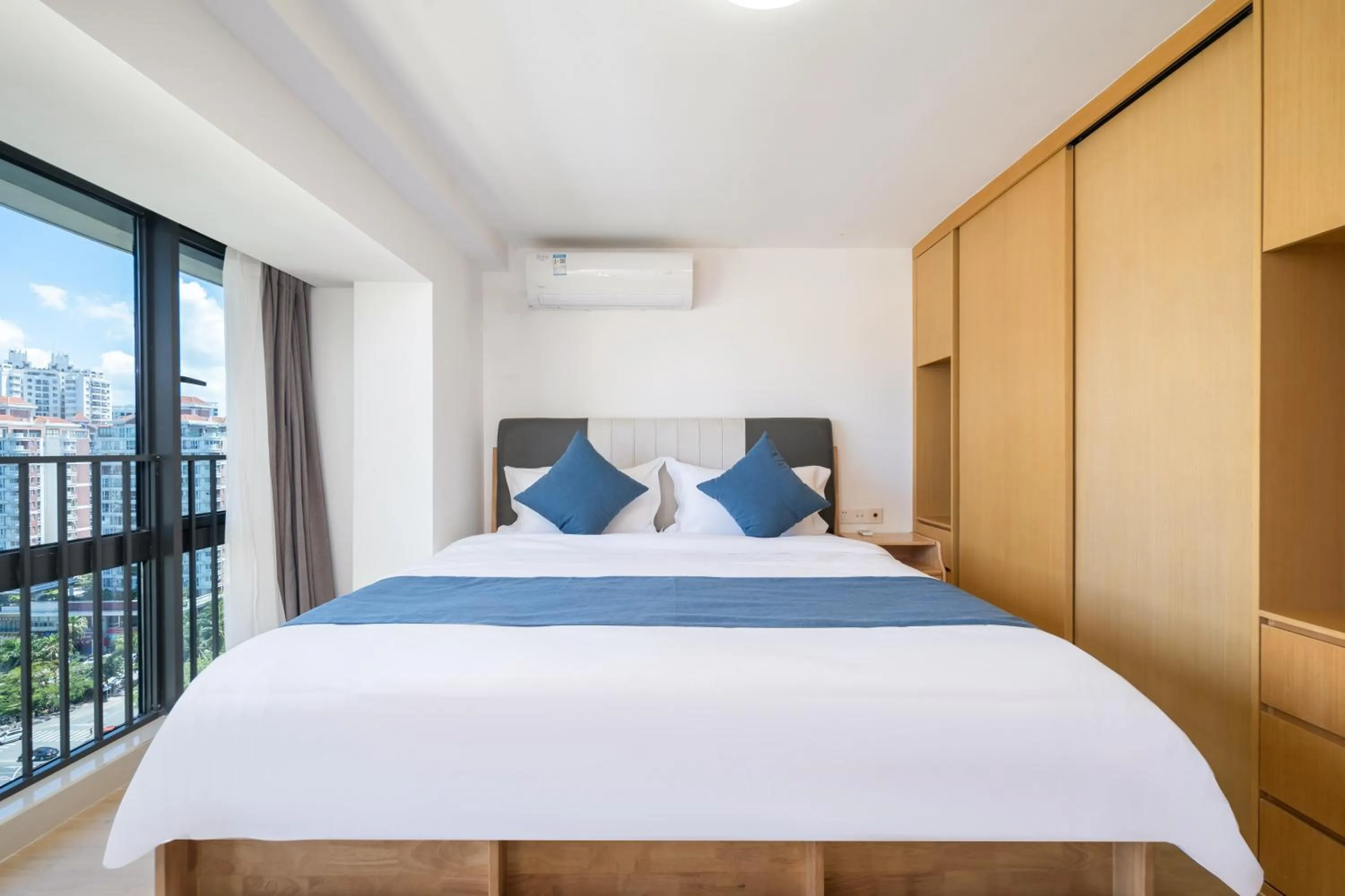 Bedroom, Bed in Neal Yat Seaview Apartment Haitang Bay Sanya