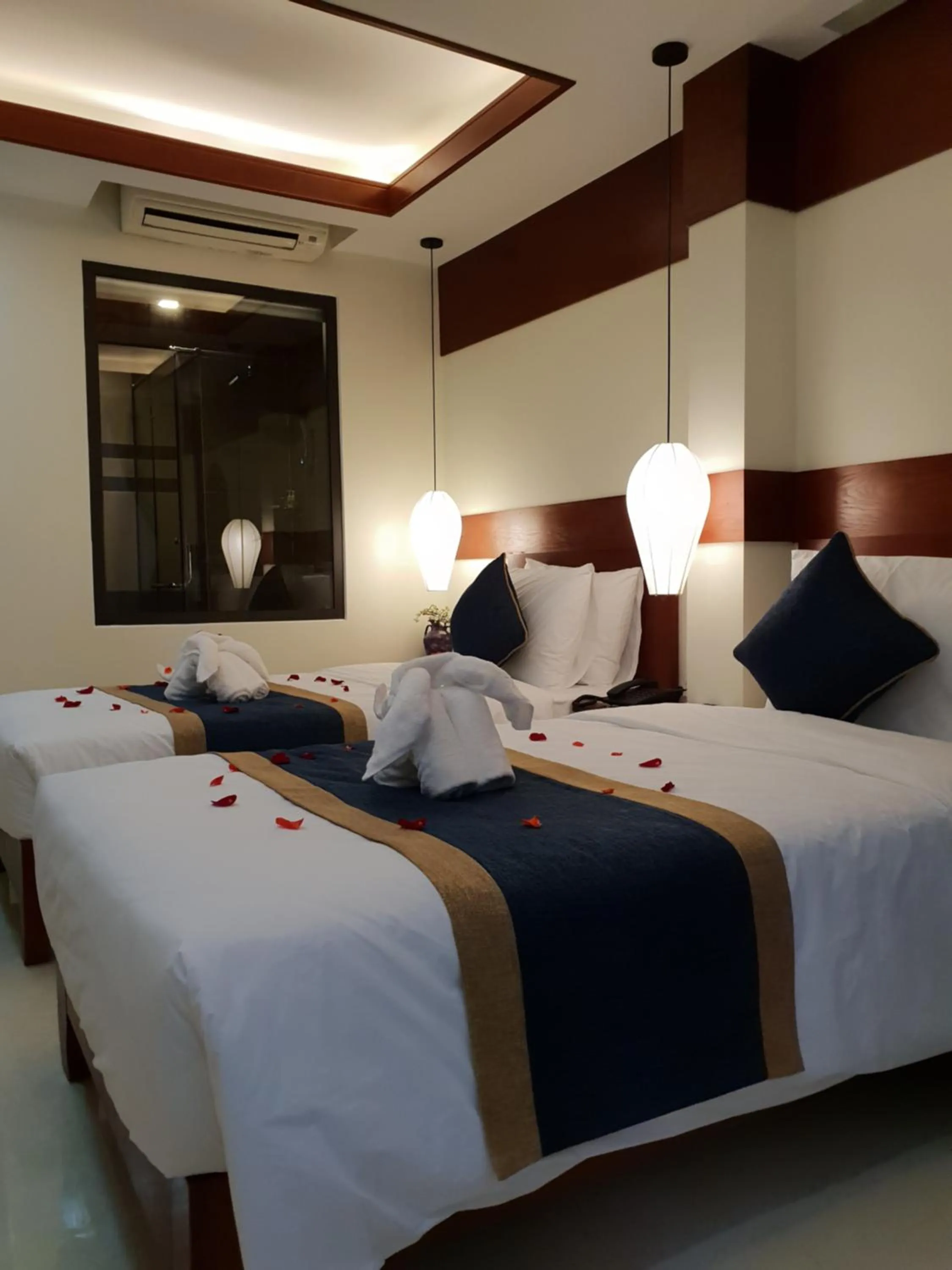 Bed in Southern Hotel Hoi An