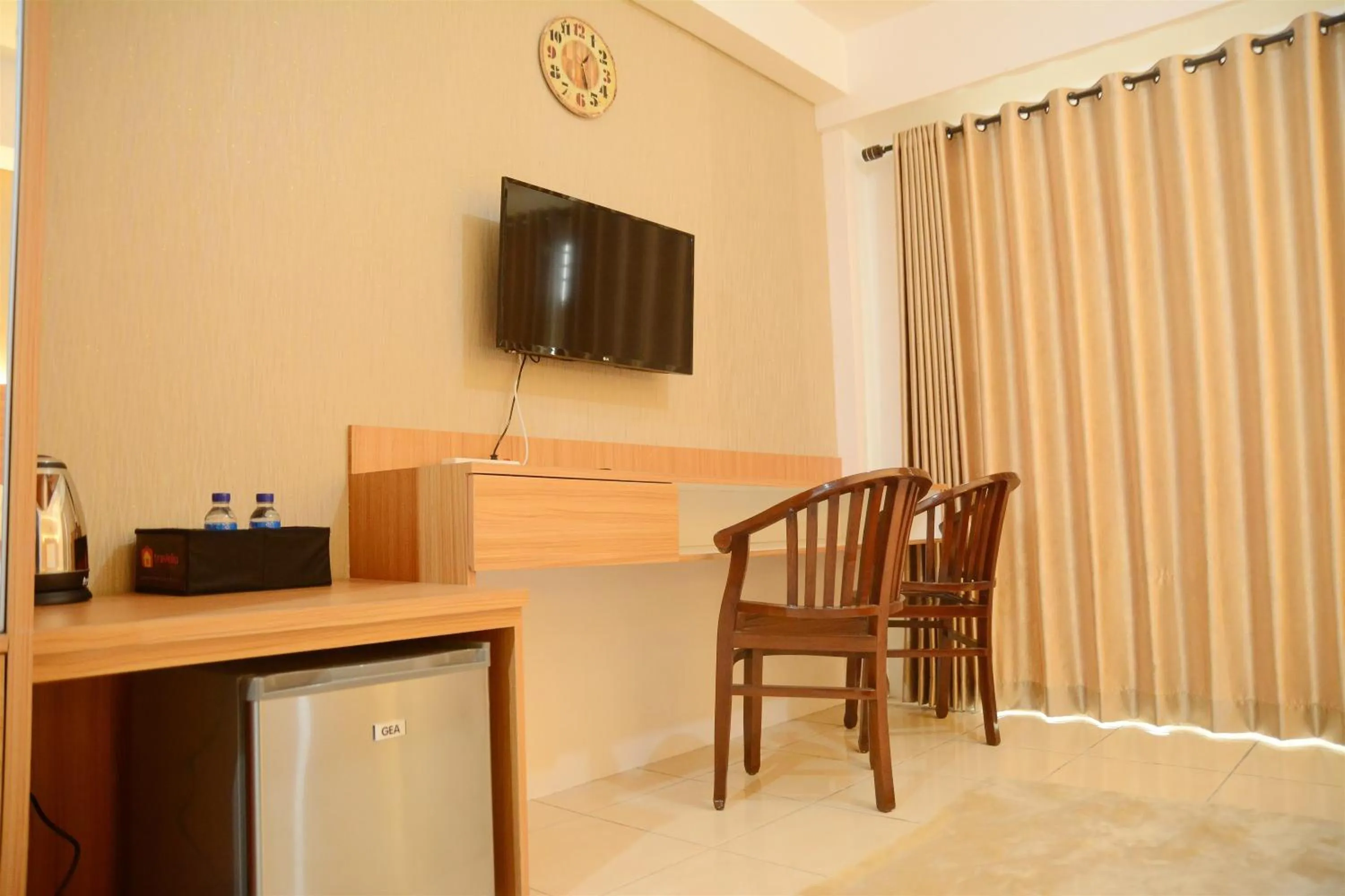 TV and multimedia in Simply Studio Room at Annora Living Apartment Tangerang By Travelio