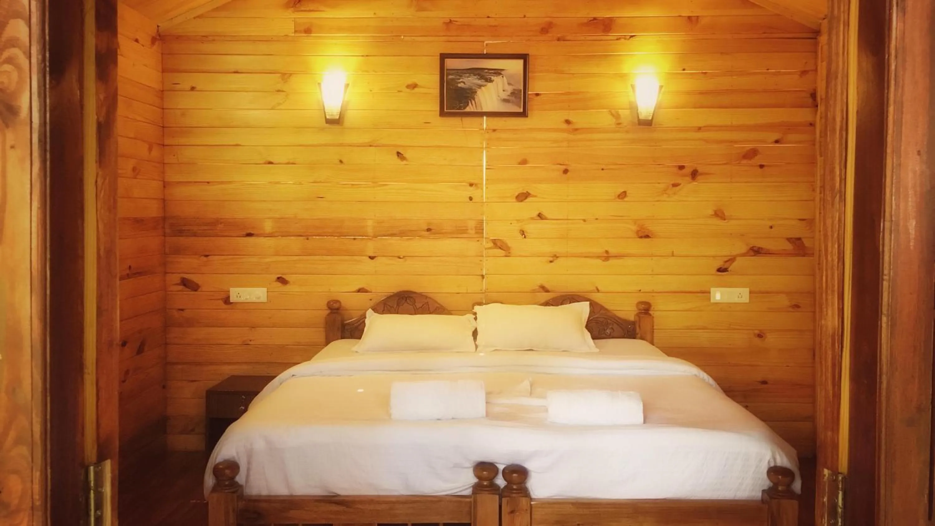 Bed in Palolem Luxuries Beach Cottages