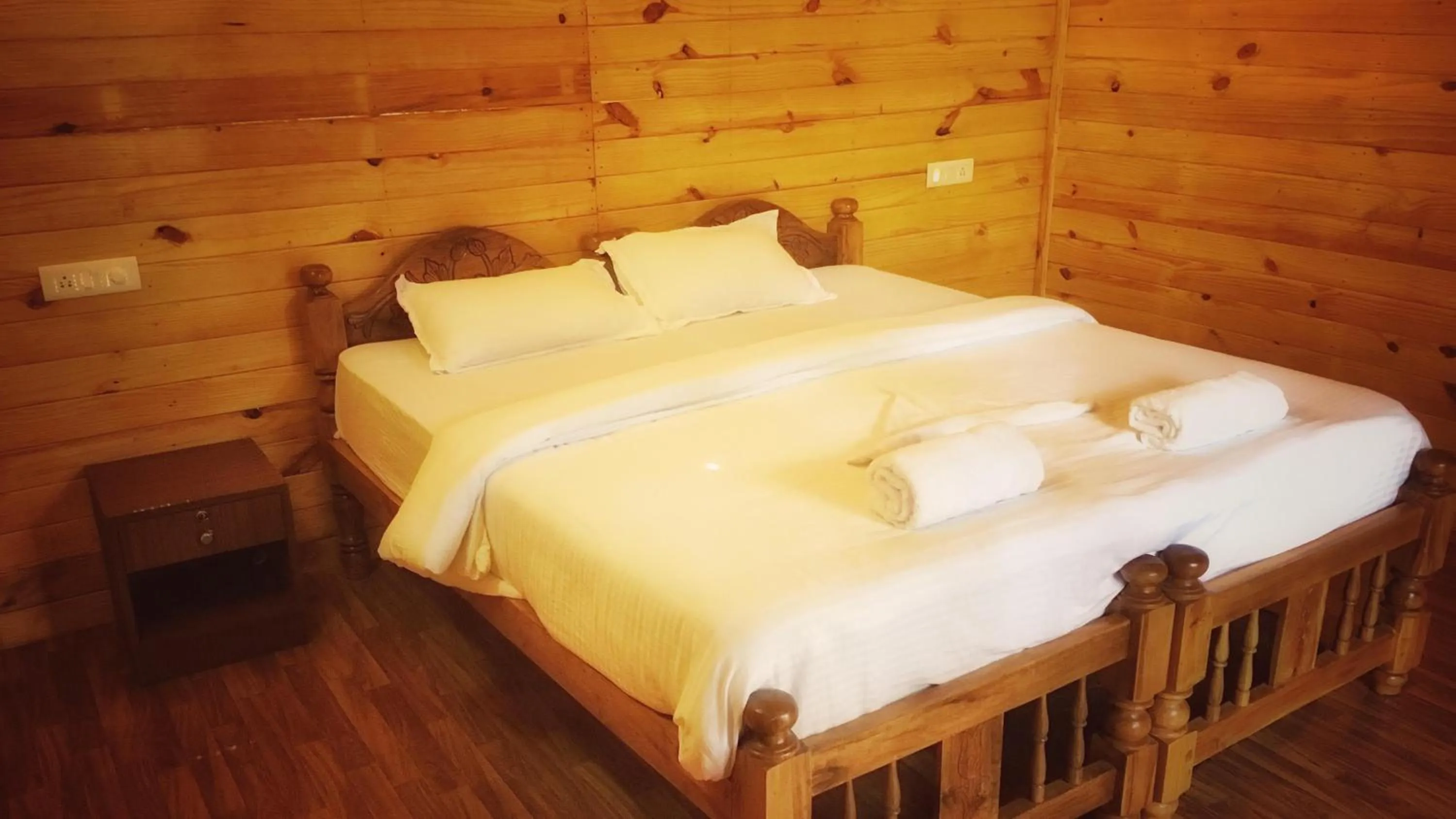 Bed in Palolem Luxuries Beach Cottages