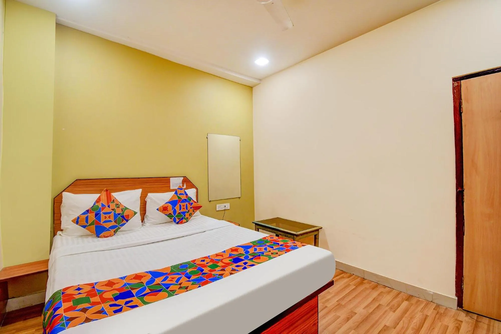 Bed in FabHotel Kamala Inn