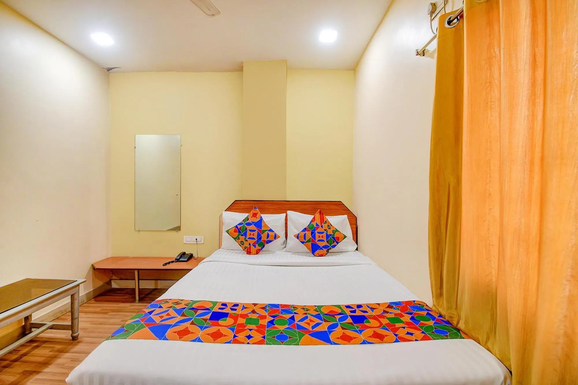 Bed in FabHotel Kamala Inn