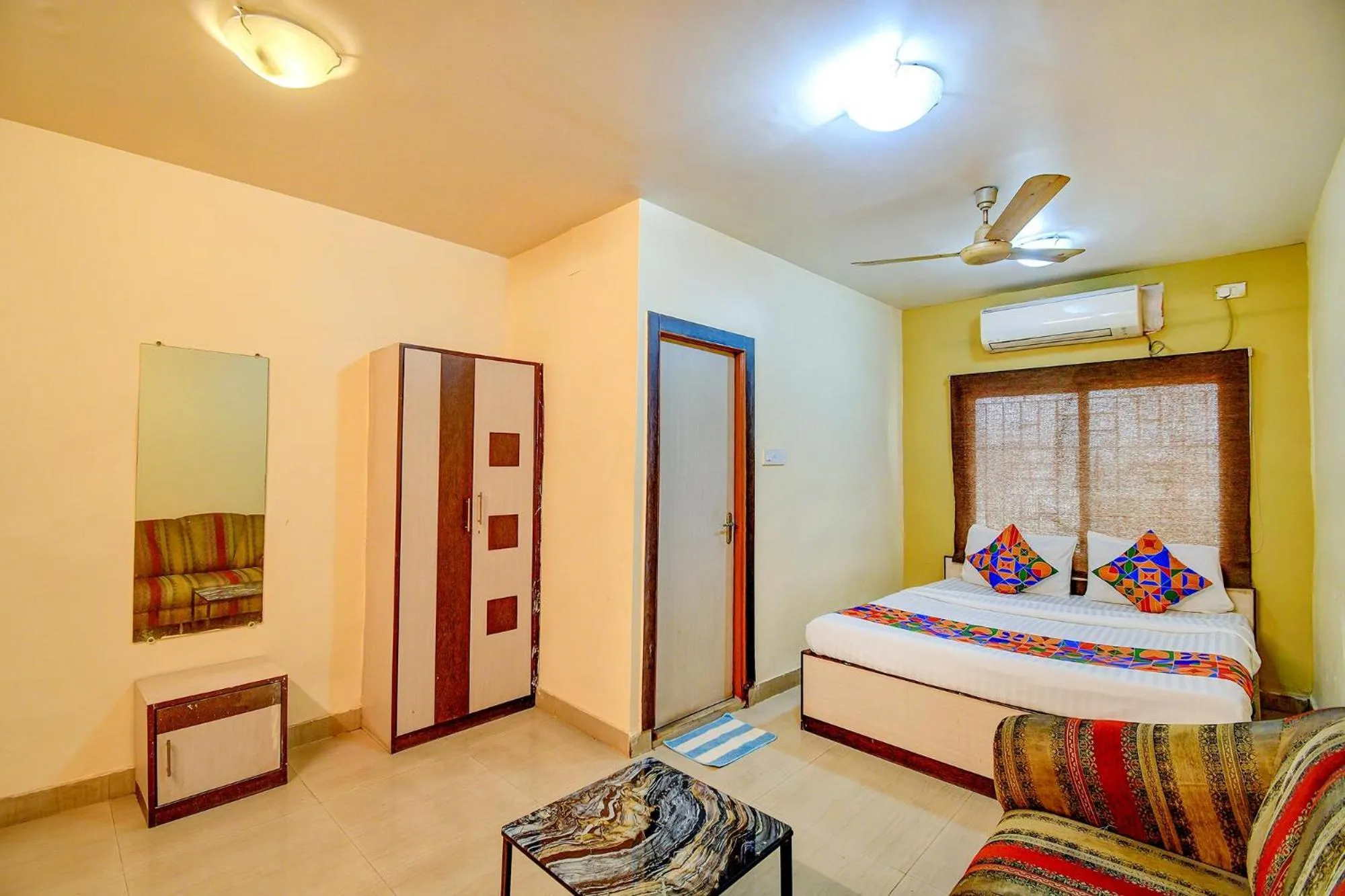 Bed in FabHotel Kamala Inn