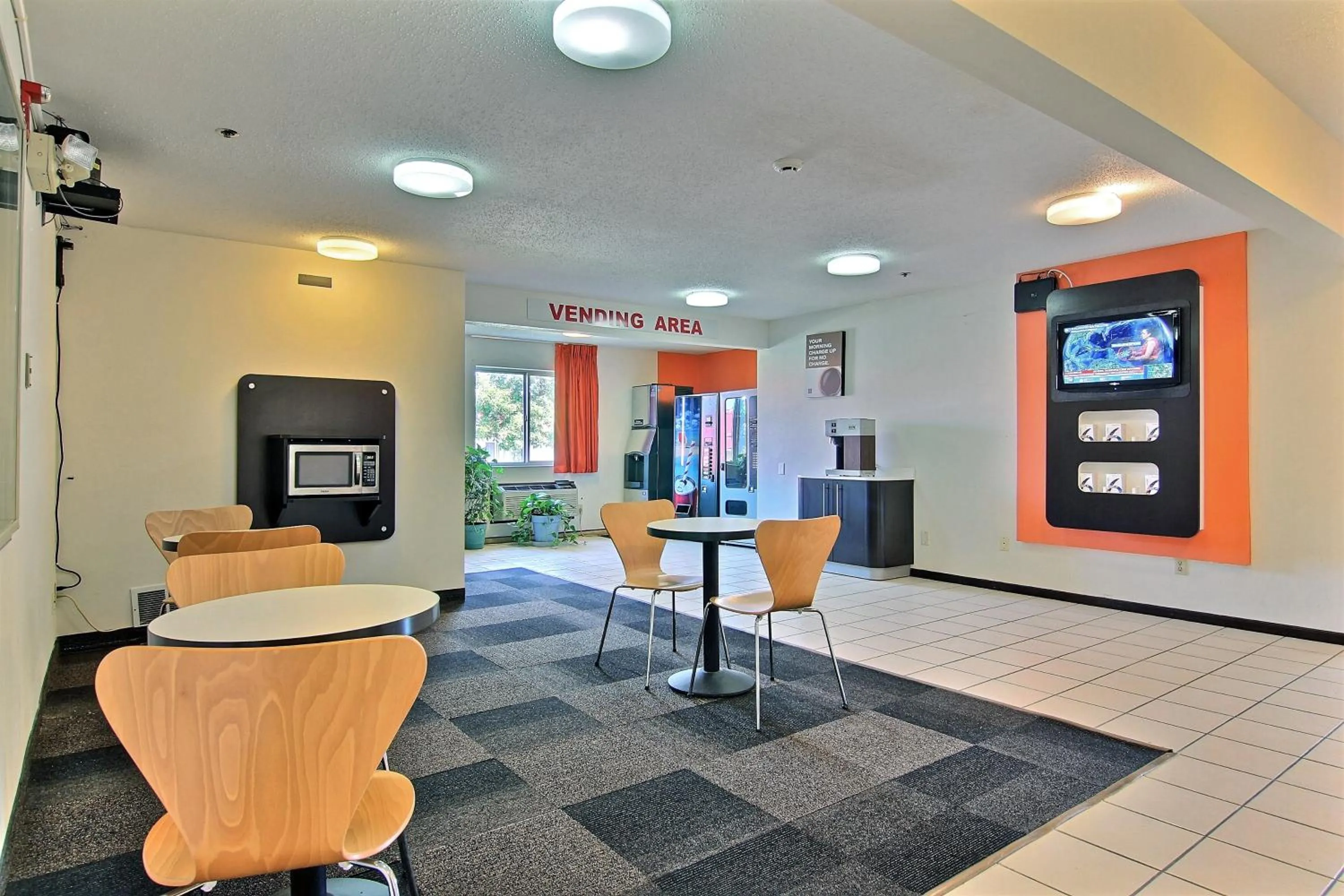 Communal lounge/ TV room in Motel 6-Gilman, IL