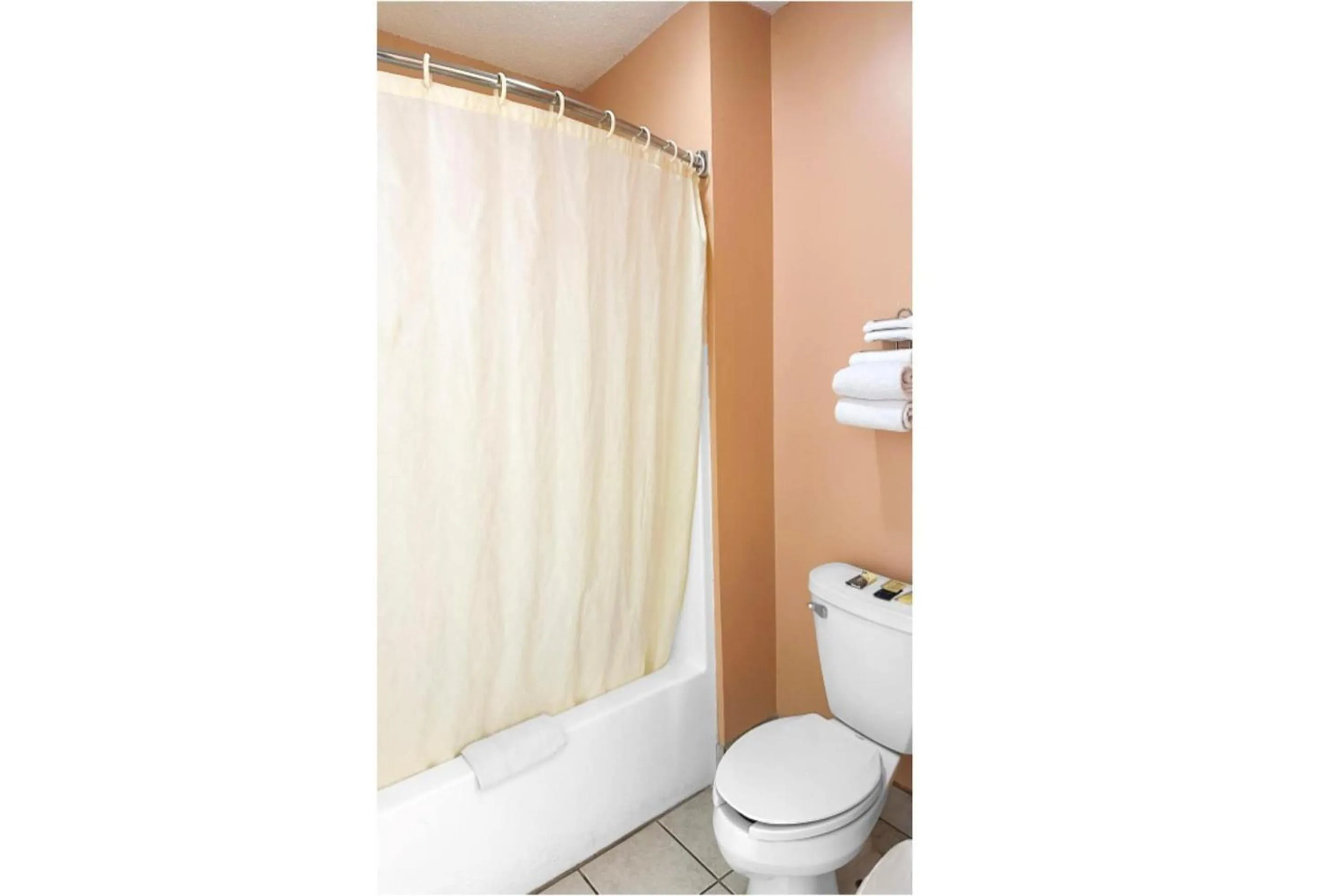 Bathroom in Garden Inn & Suites