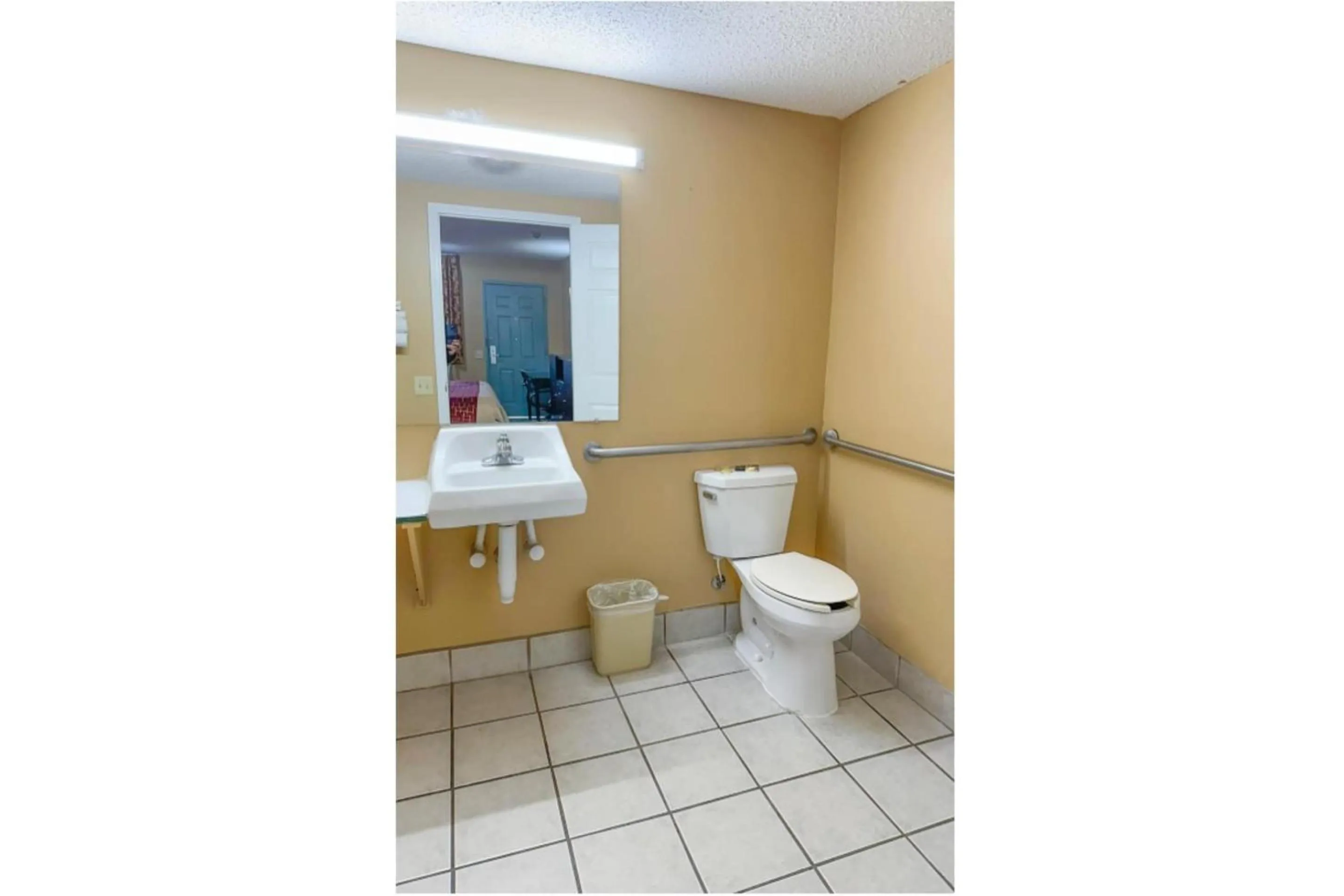 Bathroom in Garden Inn & Suites