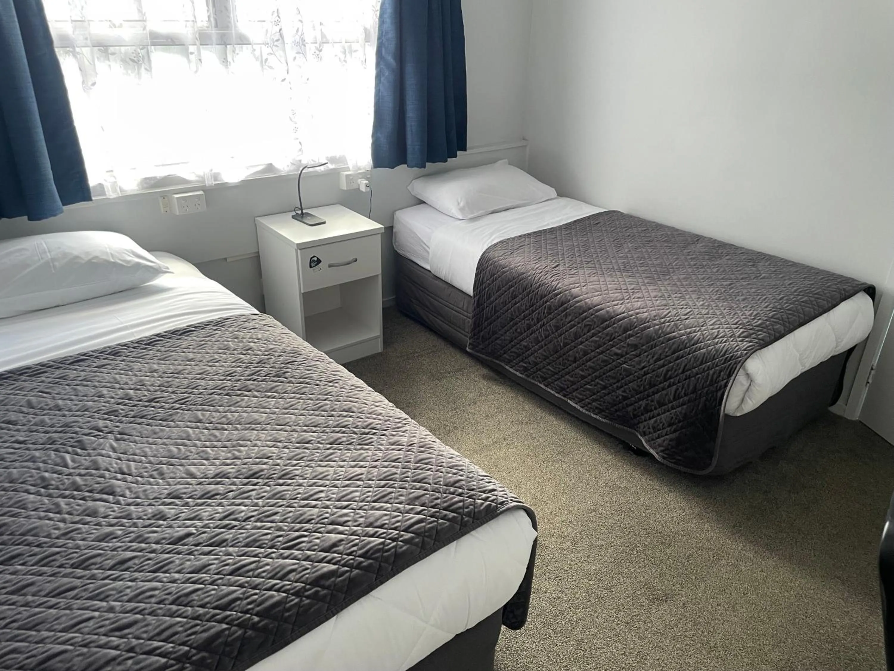 Bed in Aaron Court Motel Whangarei