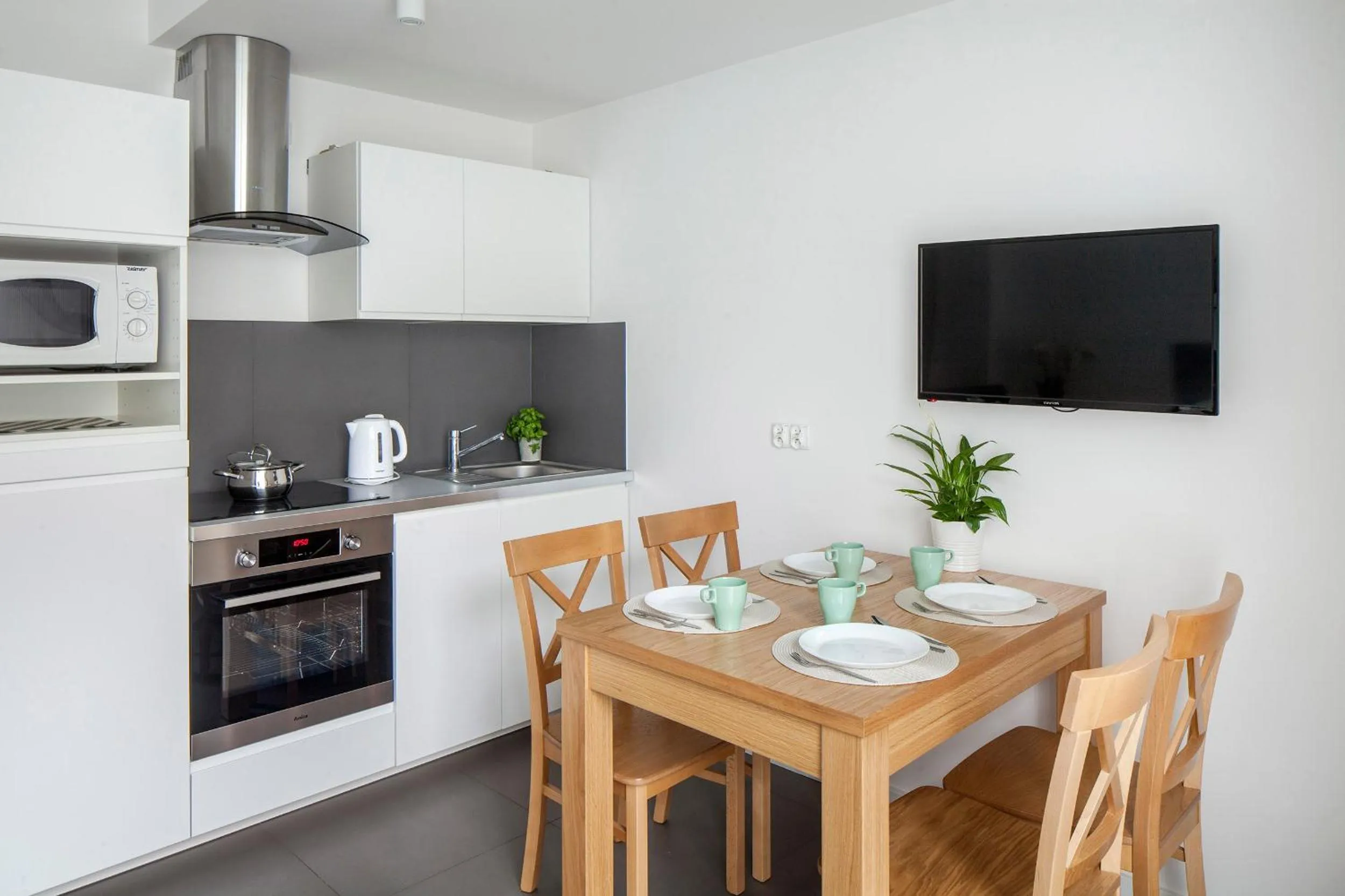 Kitchen or kitchenette in Sleepy3city Apartments Batorego 9