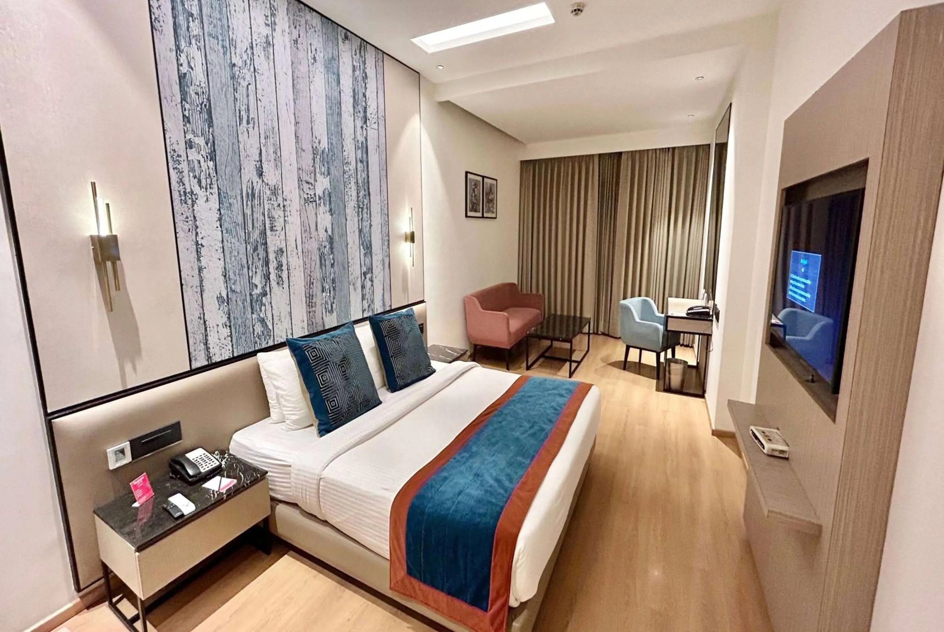 Photo of the whole room, Bed in Ramada by Wyndham Jalandhar City Center