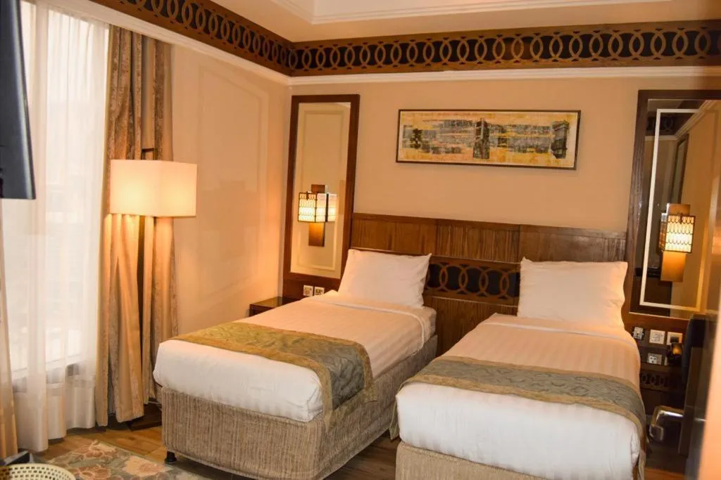 Bed in Violet Al Azizia Hotel MASJID Al Qatari