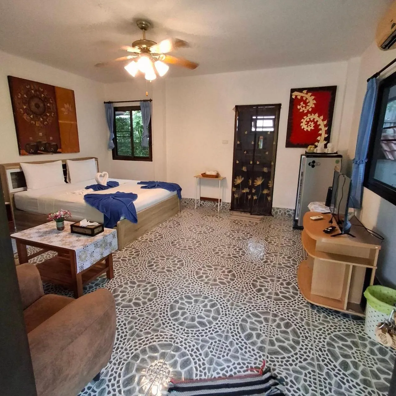 Bed in D&K Smiley Phuket Resort