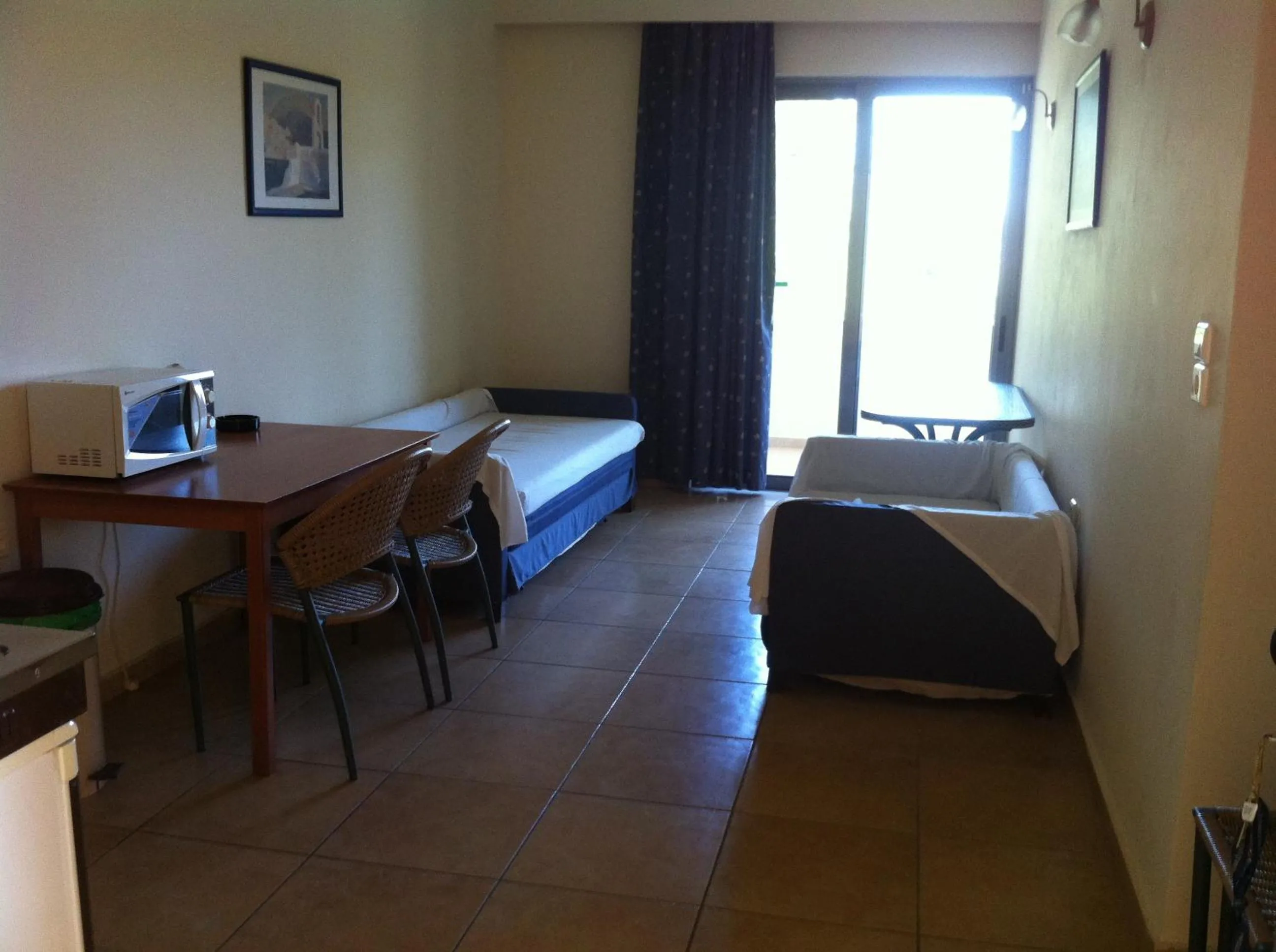 Seating area, Bed in Olgas Paradise Apartments