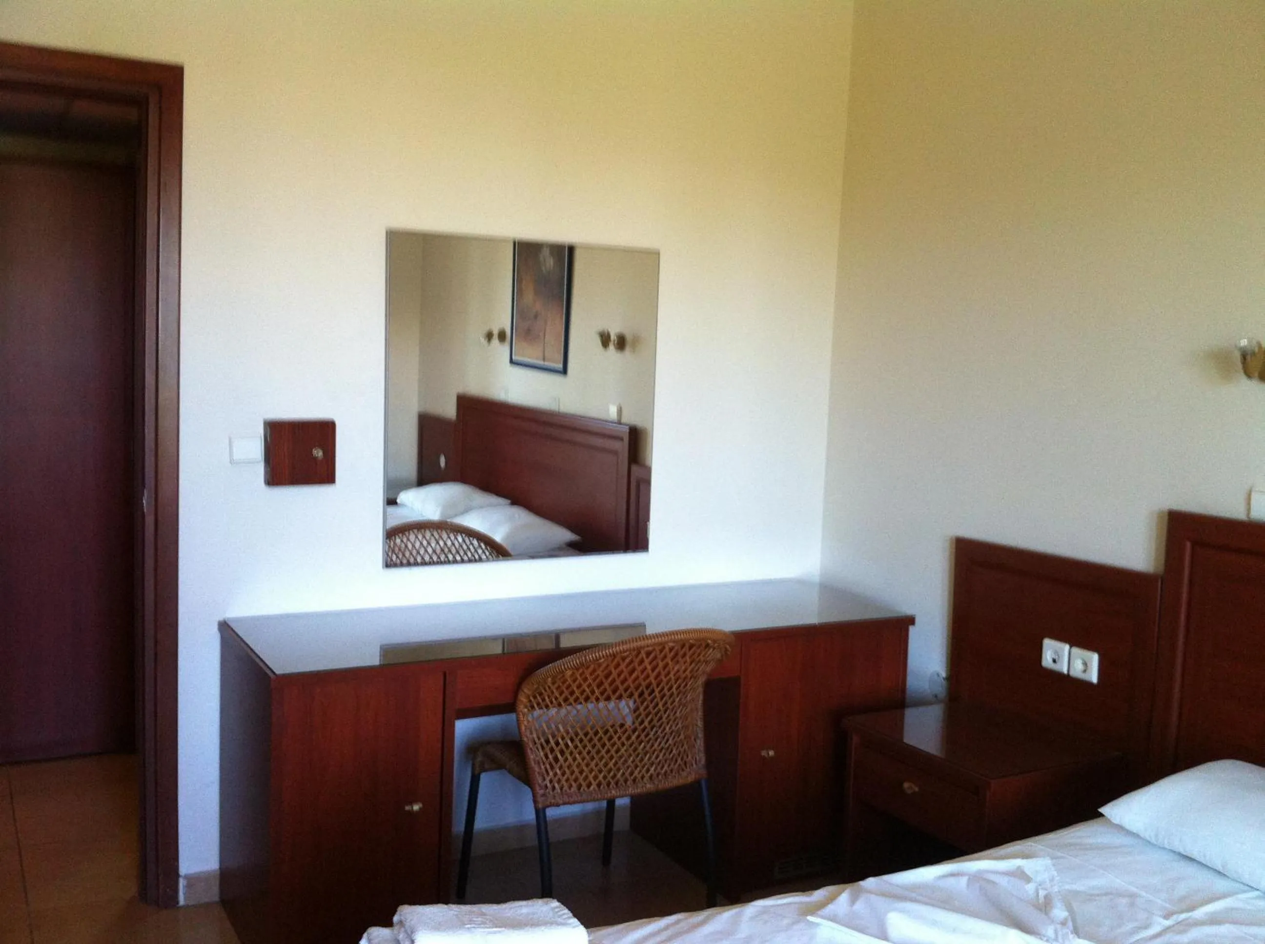 Bed in Olgas Paradise Apartments