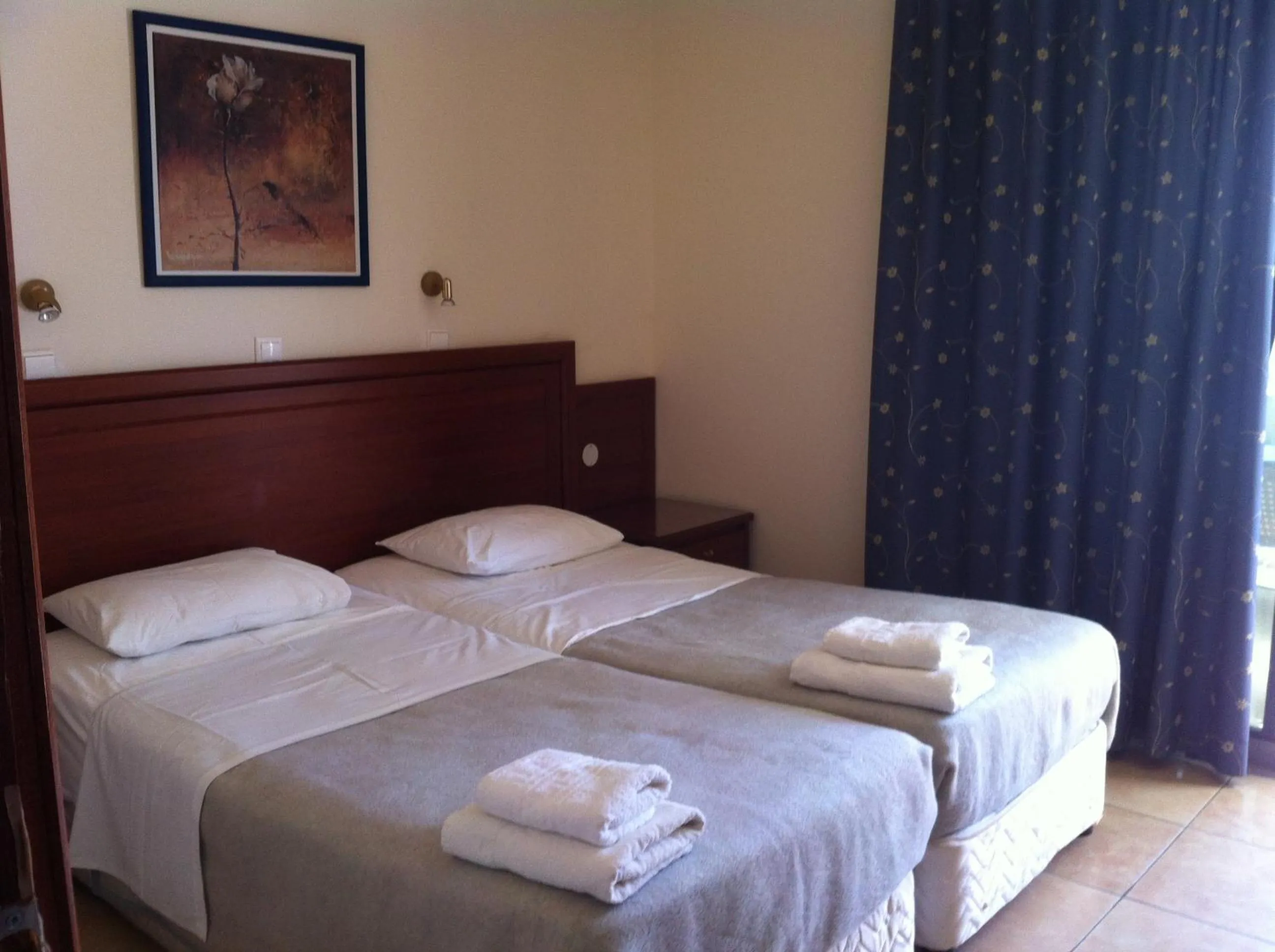 Bed in Olgas Paradise Apartments