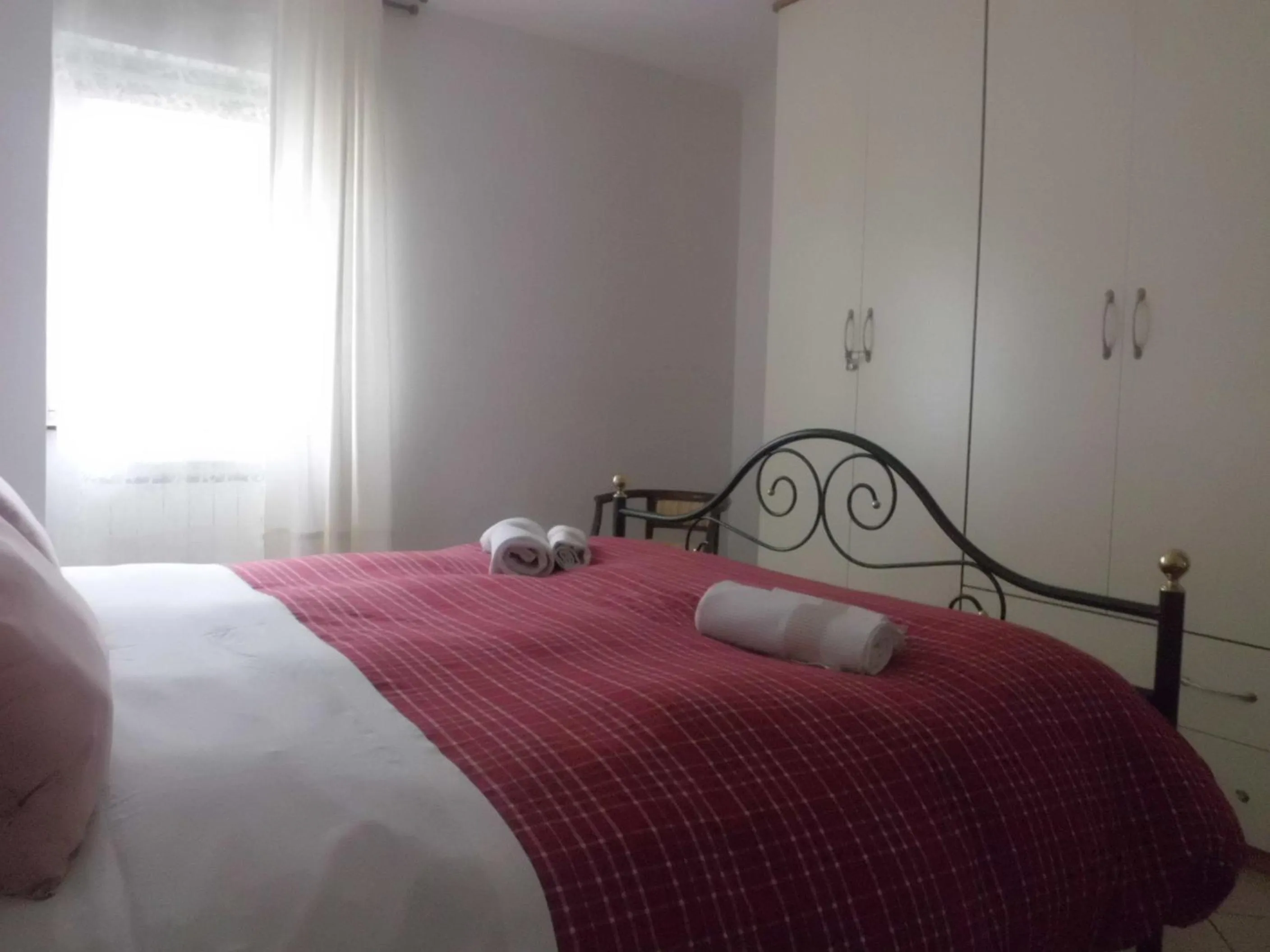 Photo of the whole room, Bed in Casa Fattorini