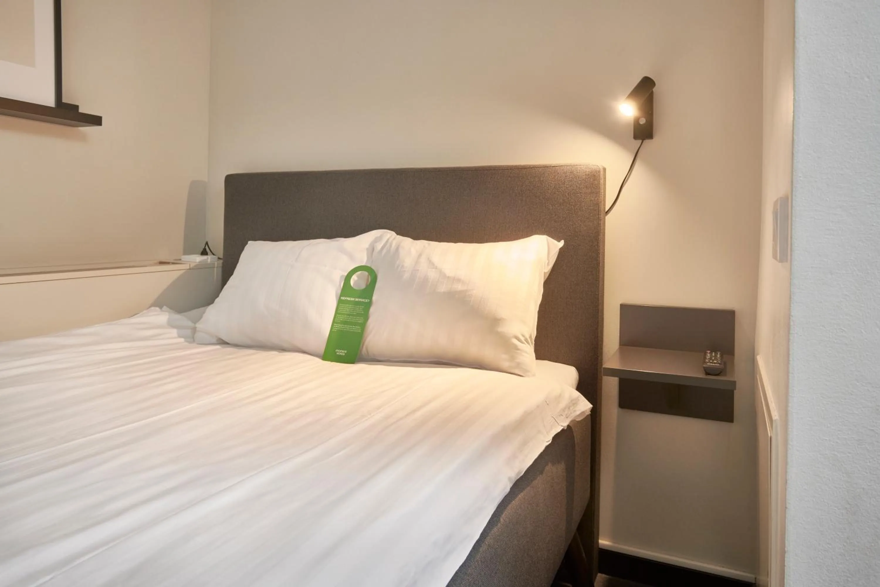 Bed in Moment Hotels