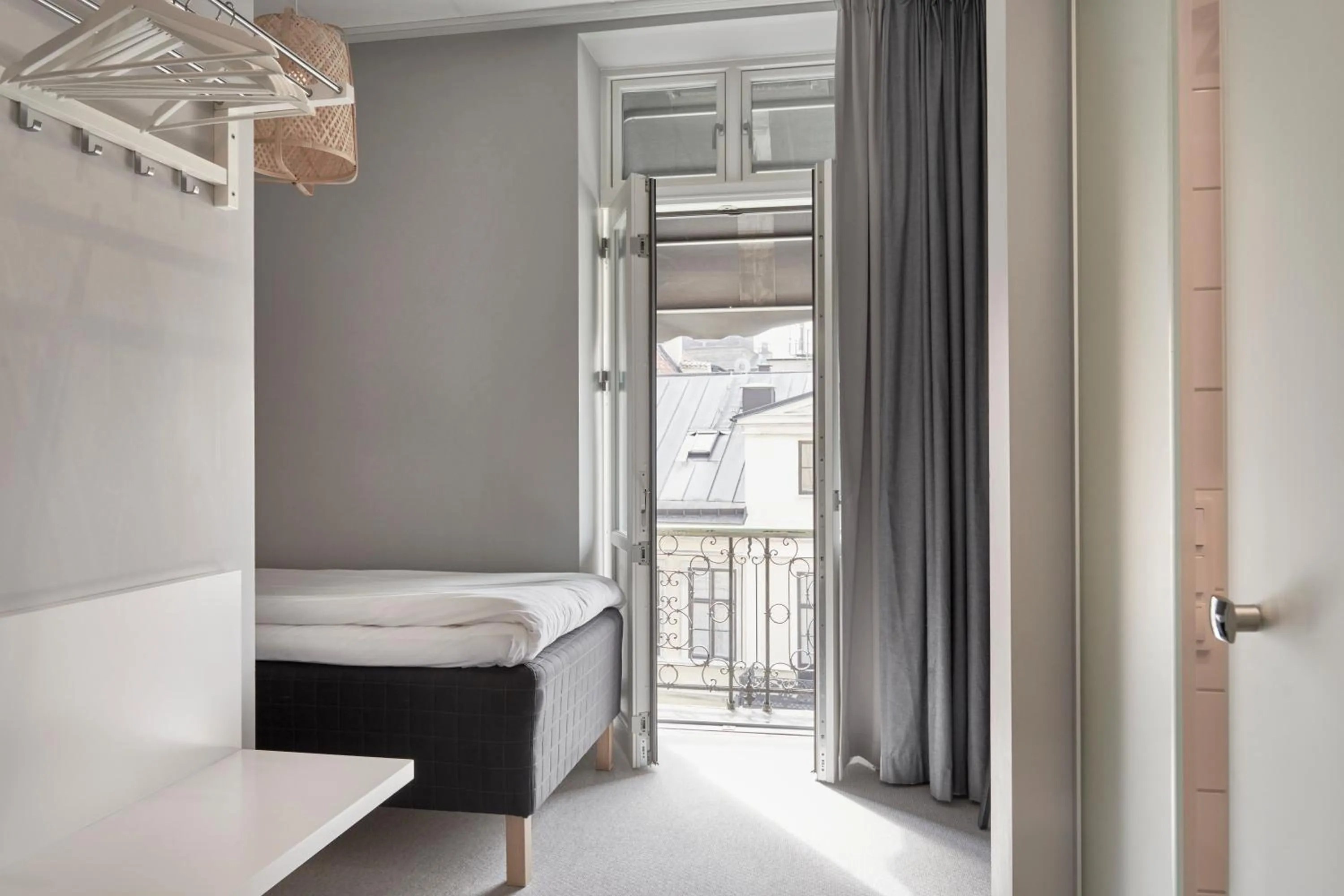 Photo of the whole room, Bed in Moment Hotels