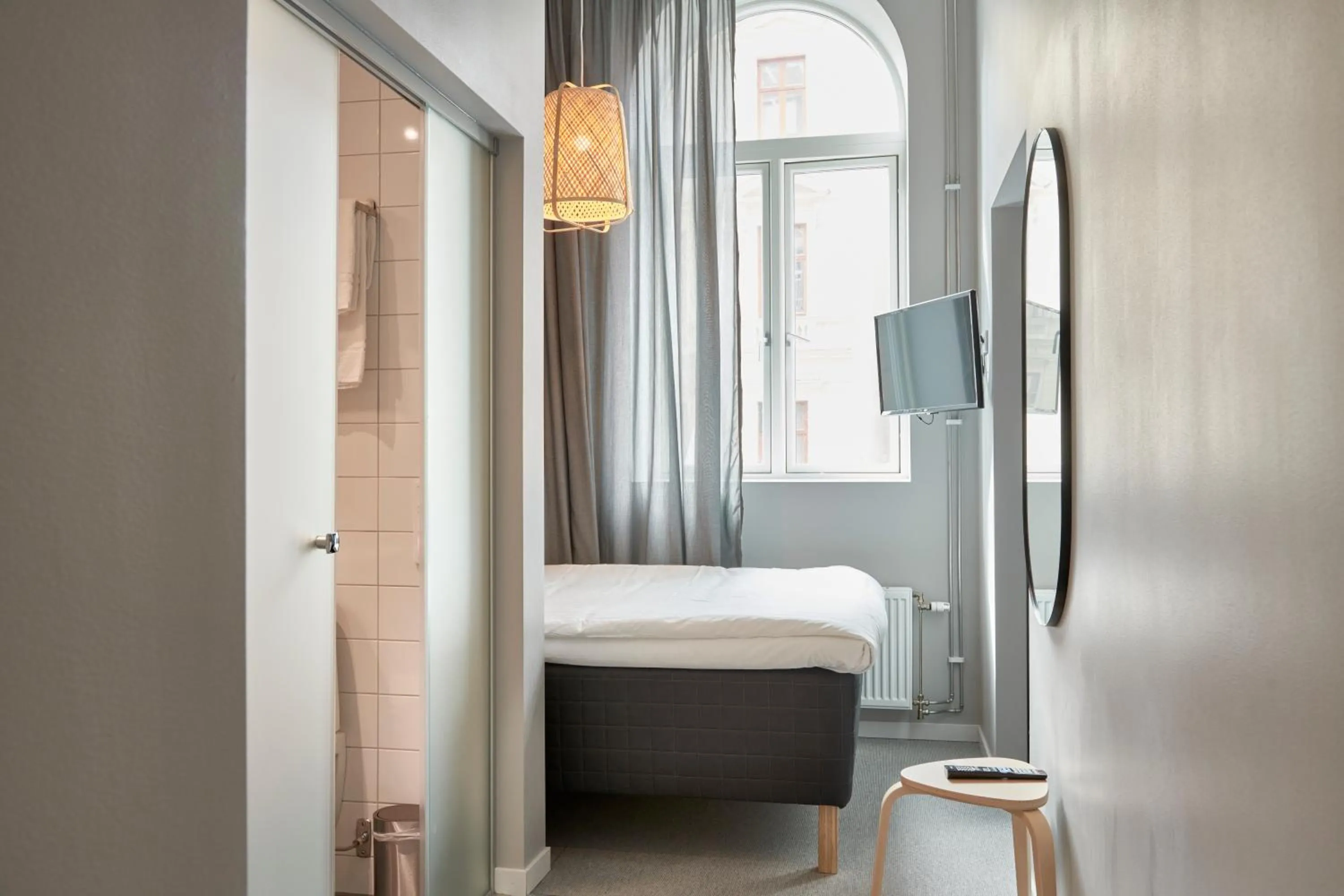 Photo of the whole room, Bed in Moment Hotels