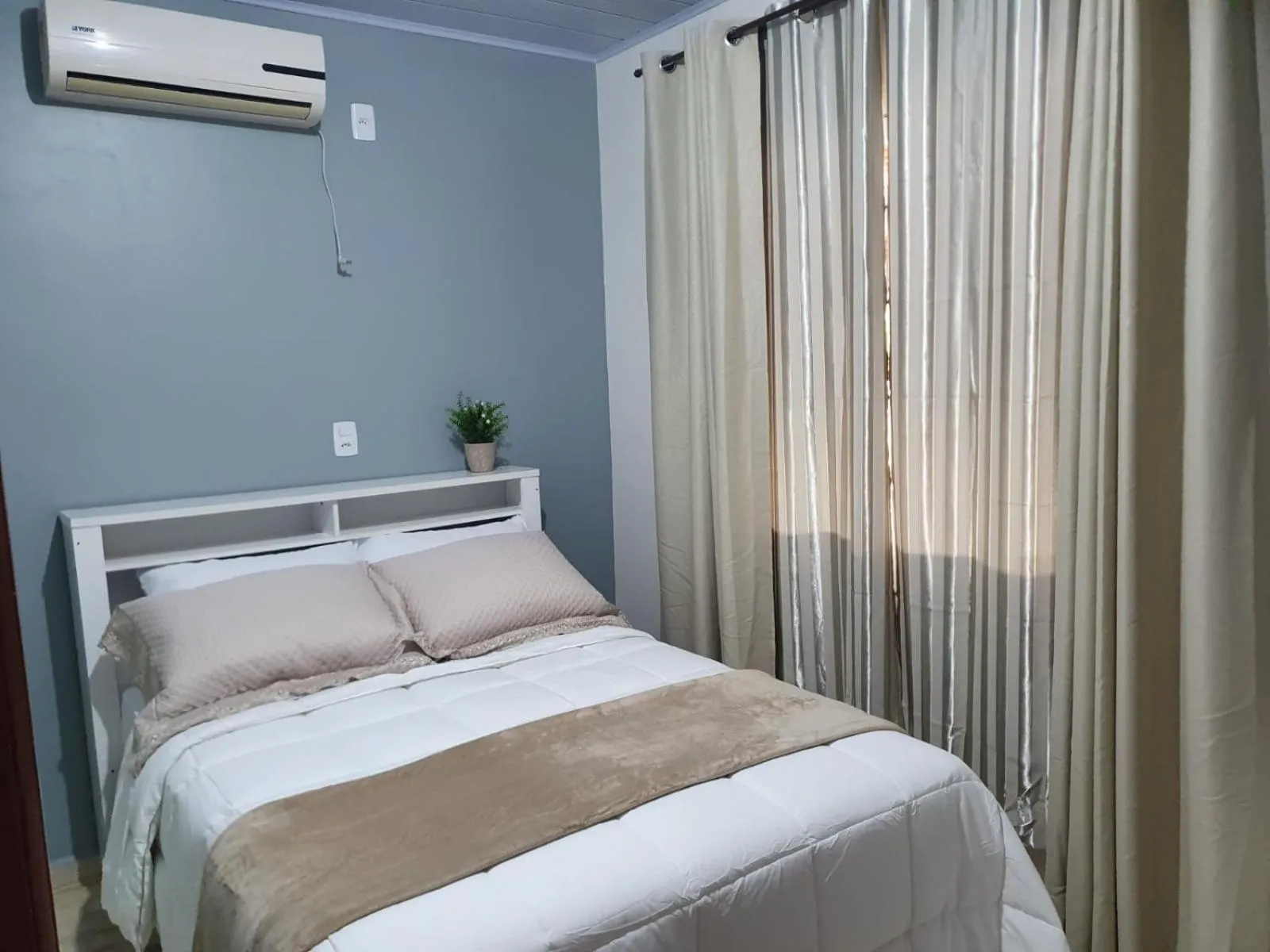 Bed in Pousada Família Cordeiro